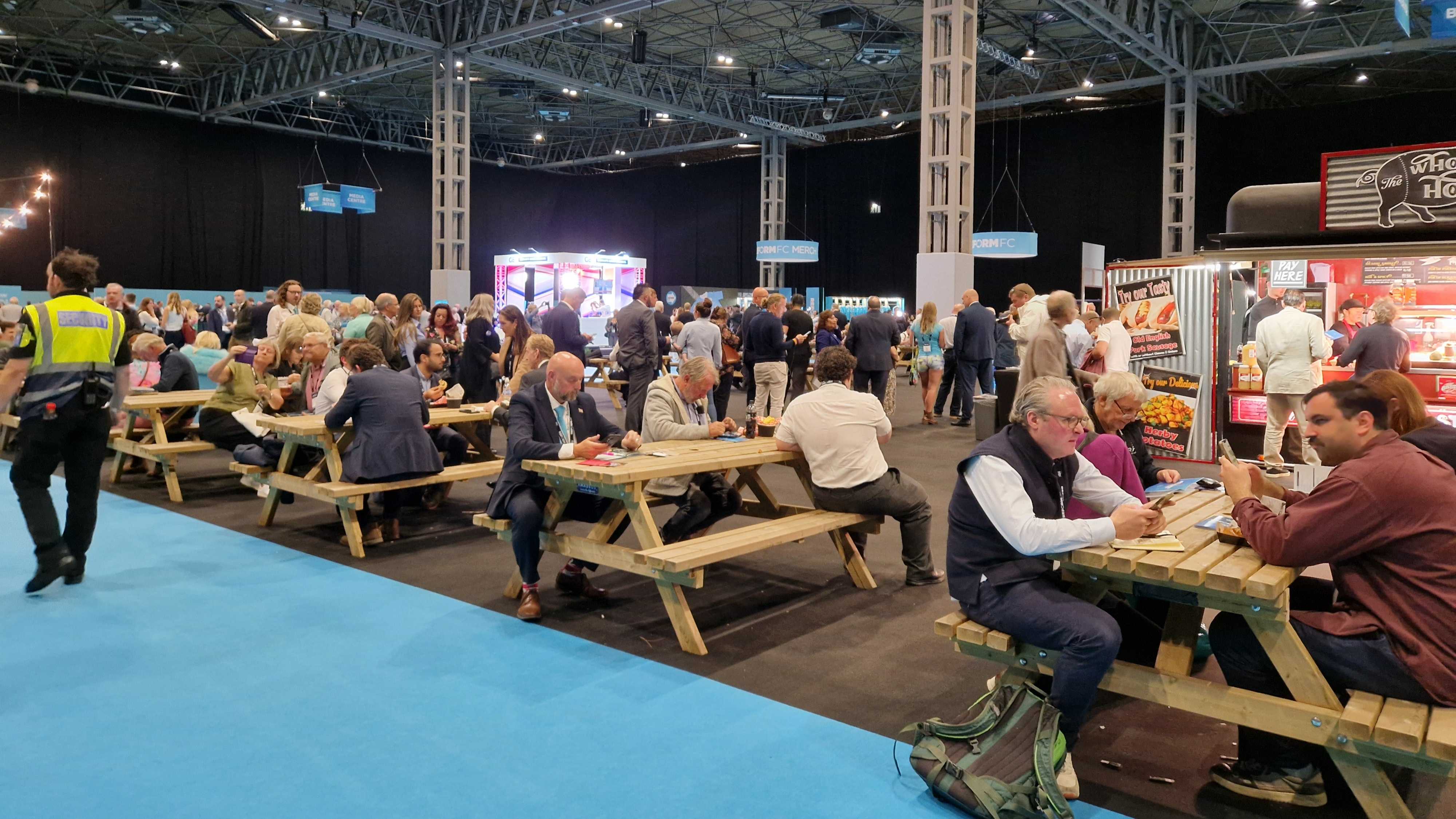 Attendees enjoy lunch and drinks at the Reform conference. (Imran Mulla/MEE)