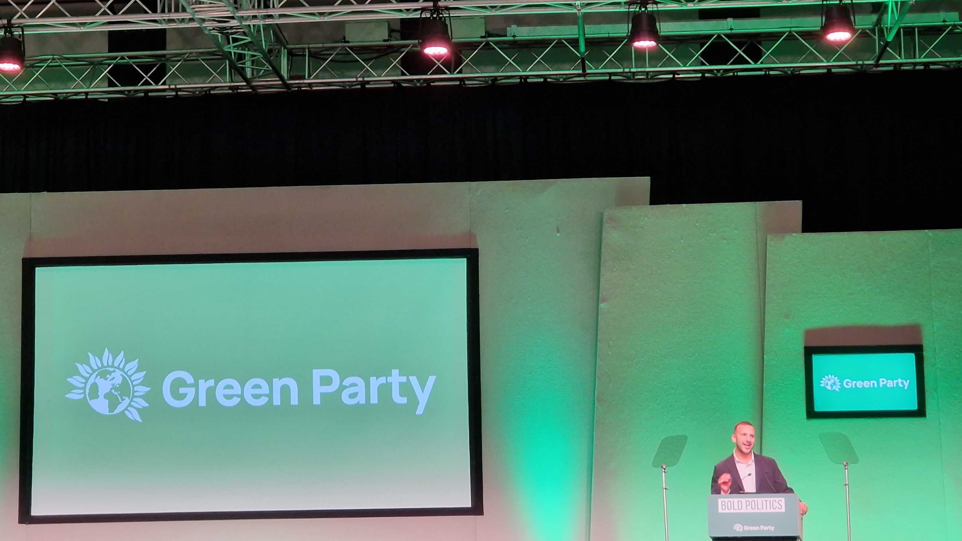 Green Party Leader Zack Polanski addresses the membership at the annual conference on Friday 3 October. (Imran Mulla/MEE)