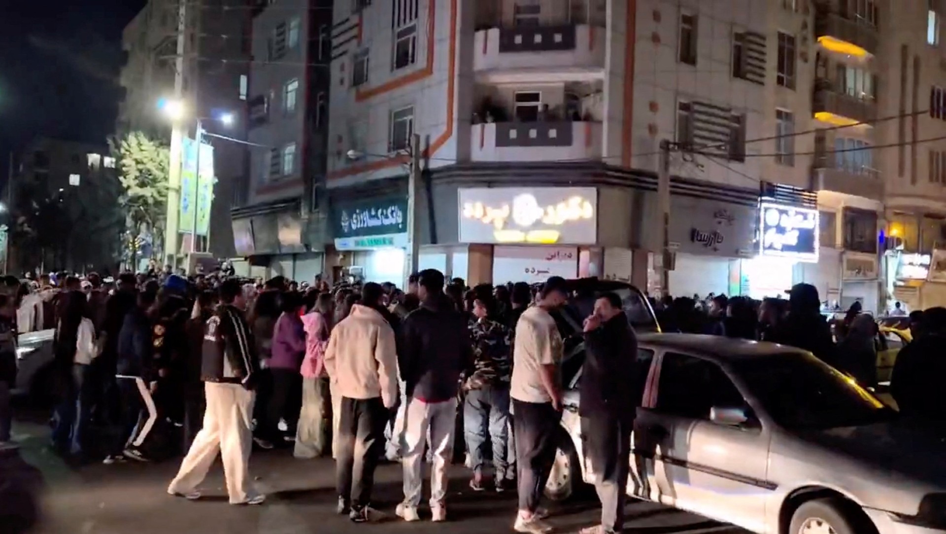 People gather to celebrate after reports of Iran's Supreme Leader Ayatollah Ali Khamenei's death, in the streets of Karaj, Alborz Province, Iran (social media via Reuters)