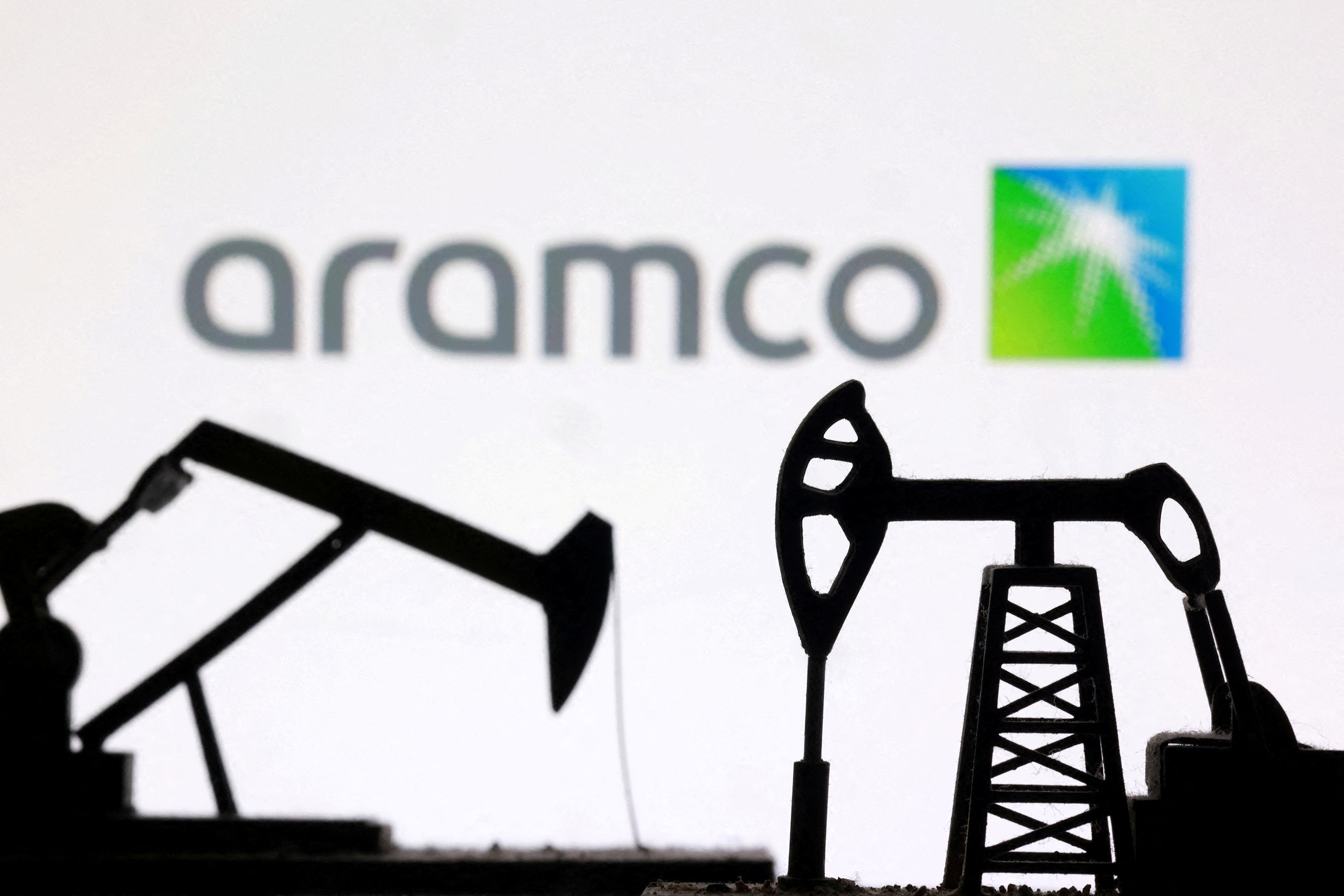 3D-printed oil pump jacks and the Saudi Aramco logo appear in this illustration taken March 2, 2026. REUTERS/Dado Ruvic/Illustration/File Photo