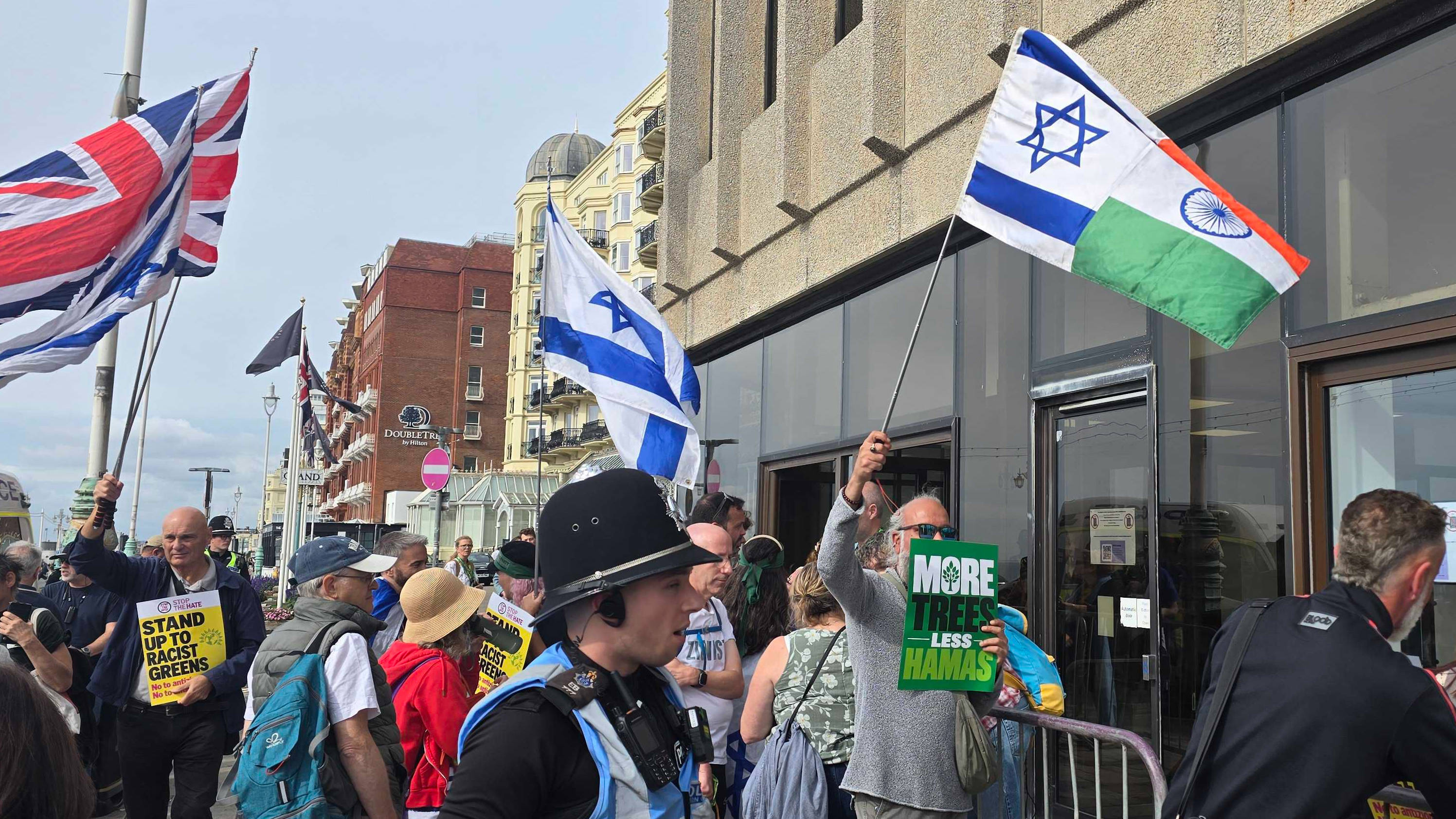 ​  Pro-Israel protesters stand outside the Green Party conference in Brighton on Saturday. (Imran Mulla/MEE)  ​