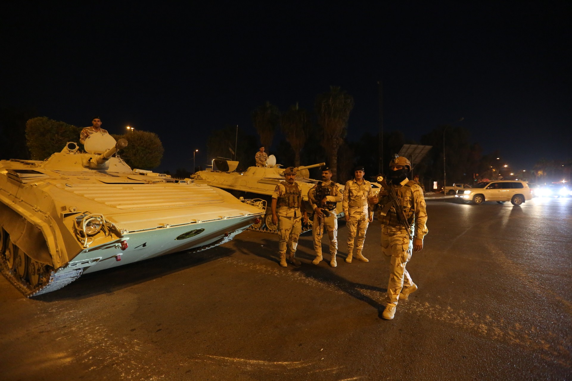 Soldiers deployed in Baghdad near the Iraqi intelligence services headquarters (MEE/Murtaja Lateef)