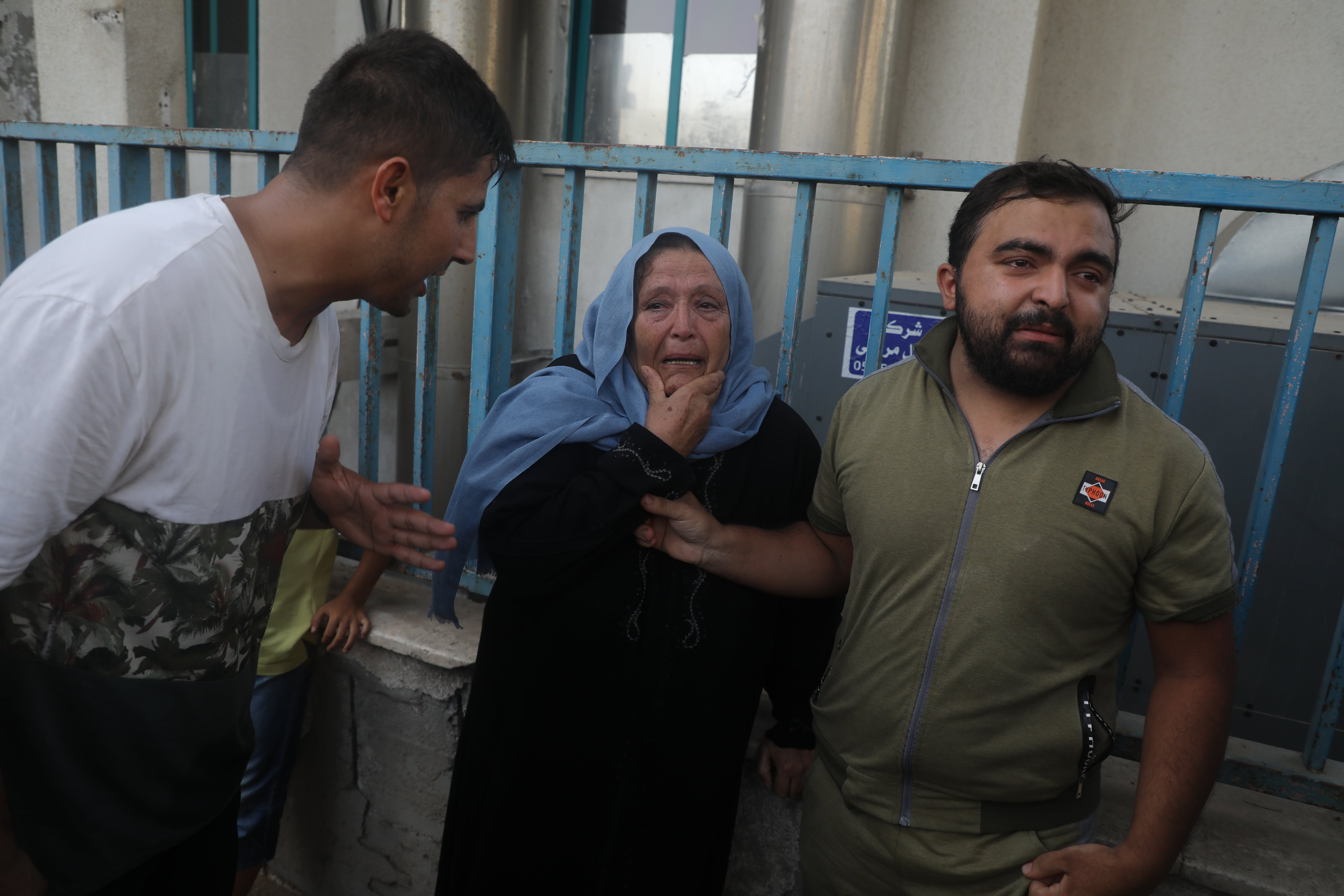 A woman mourns in Gaza City following Israeli airstrikes that killed nine Palestinians on 5 August 2022 (MEE/Mohammed al-Hajjar)