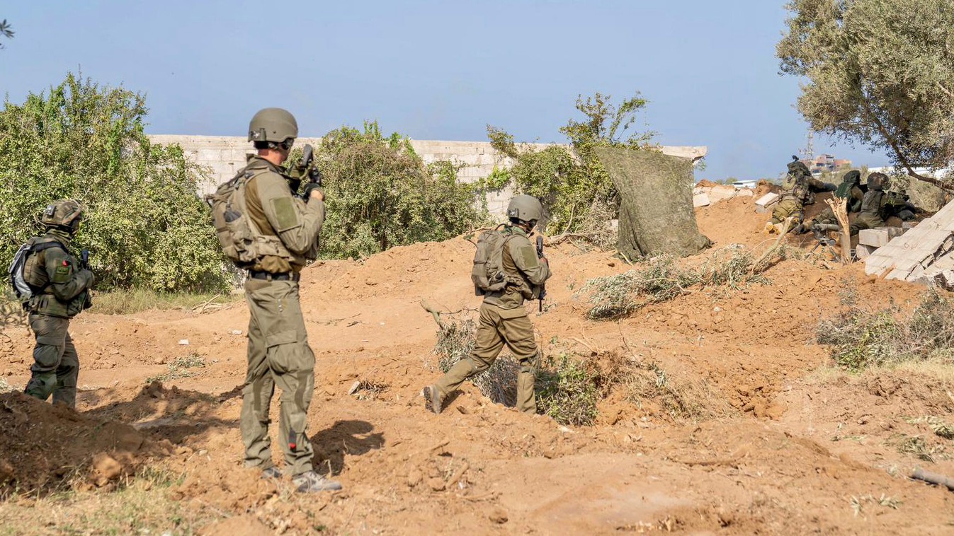 In this undated photo provided by the Israeli military, Israeli troops are seen during a ground operation in the Gaza Strip (AP)