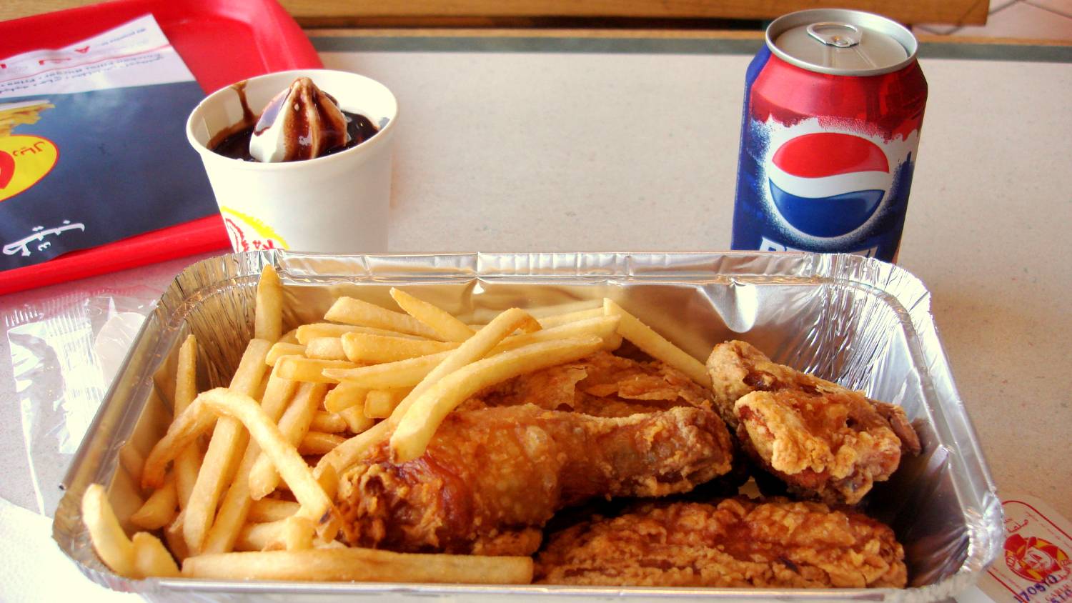 A standard chicken and chips meal at Al Baik can cost between £4 to £8 (Wikipedia)