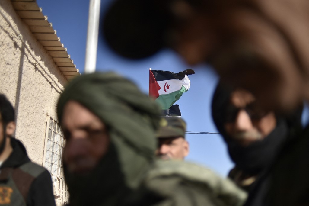 Displaced Sahrawis arrive to attend a Polisario congress at the refugee camp of Dakhla, some 170km to the southeast of the Algerian city of Tindouf, on 13 January 2023 (Ryad Kramdi/AFP)