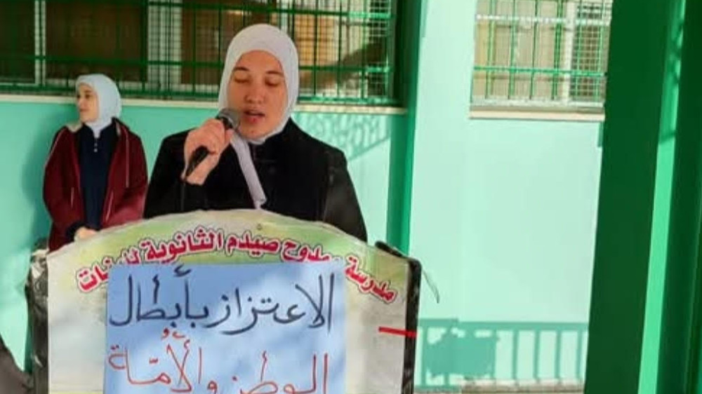 Asmaa Jouda speaks during a school event in Gaza, in an undated photo taken before she was killed in an Israeli air strike in May 2025 (Supplied).