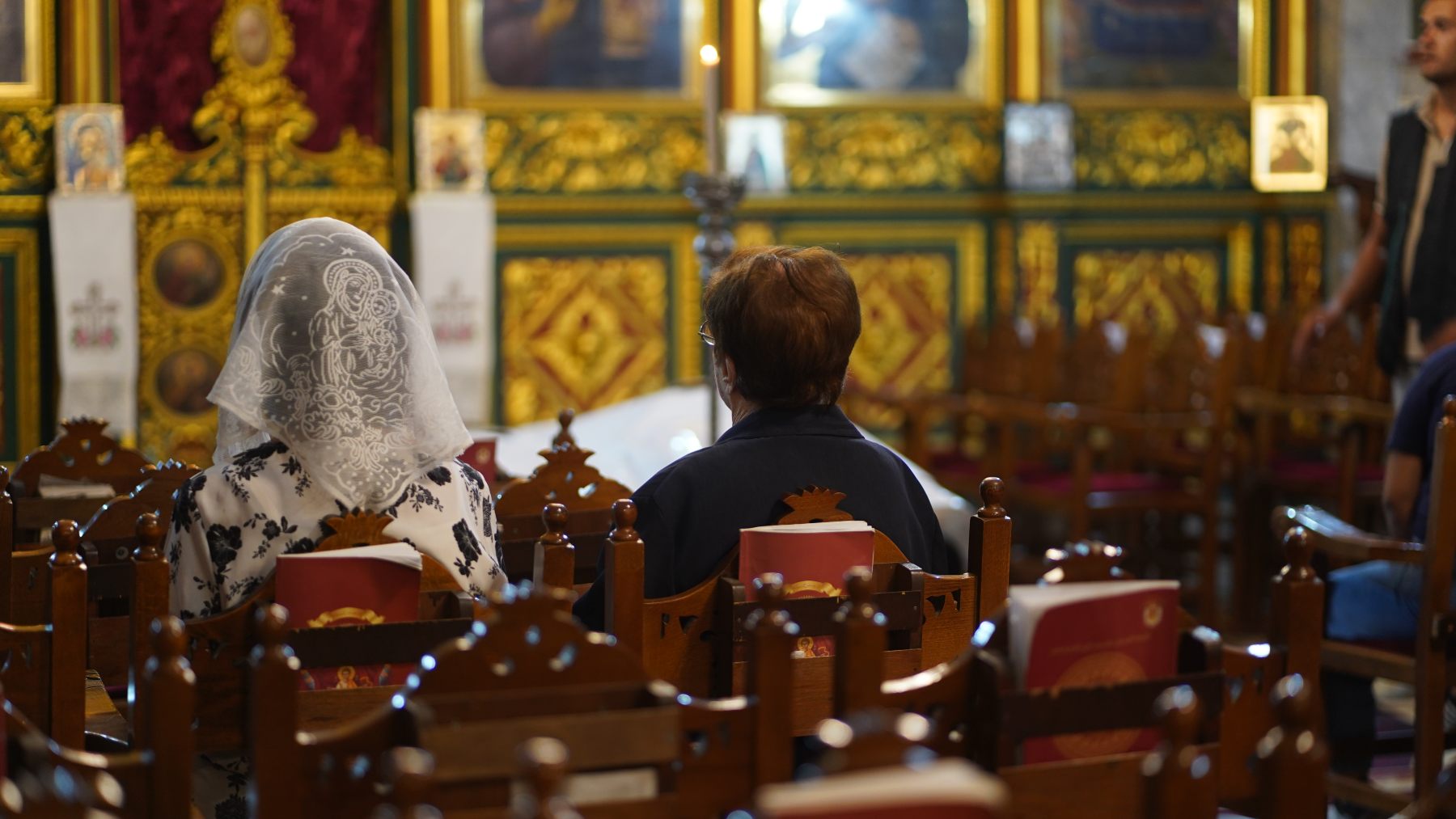 Community members gather at St Porphyrius Church in Gaza City during funeral prayers (Middle East Eye)