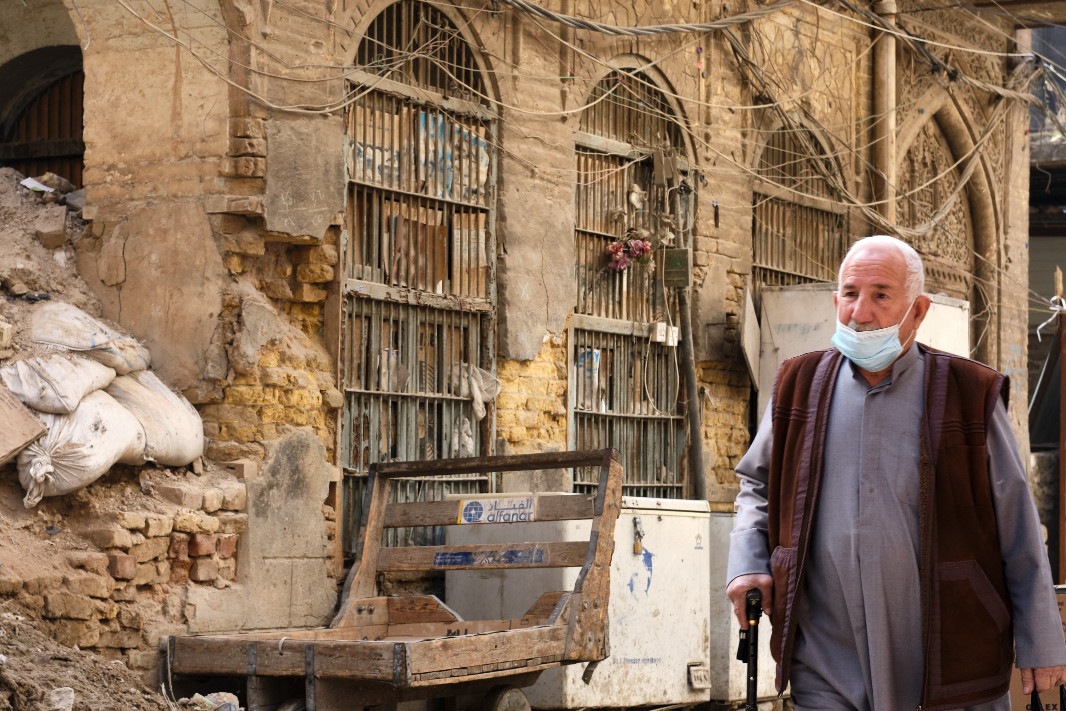An Iraqi man walks the streets of Baghdad on 25 January, 2021 (Nabil Salih)