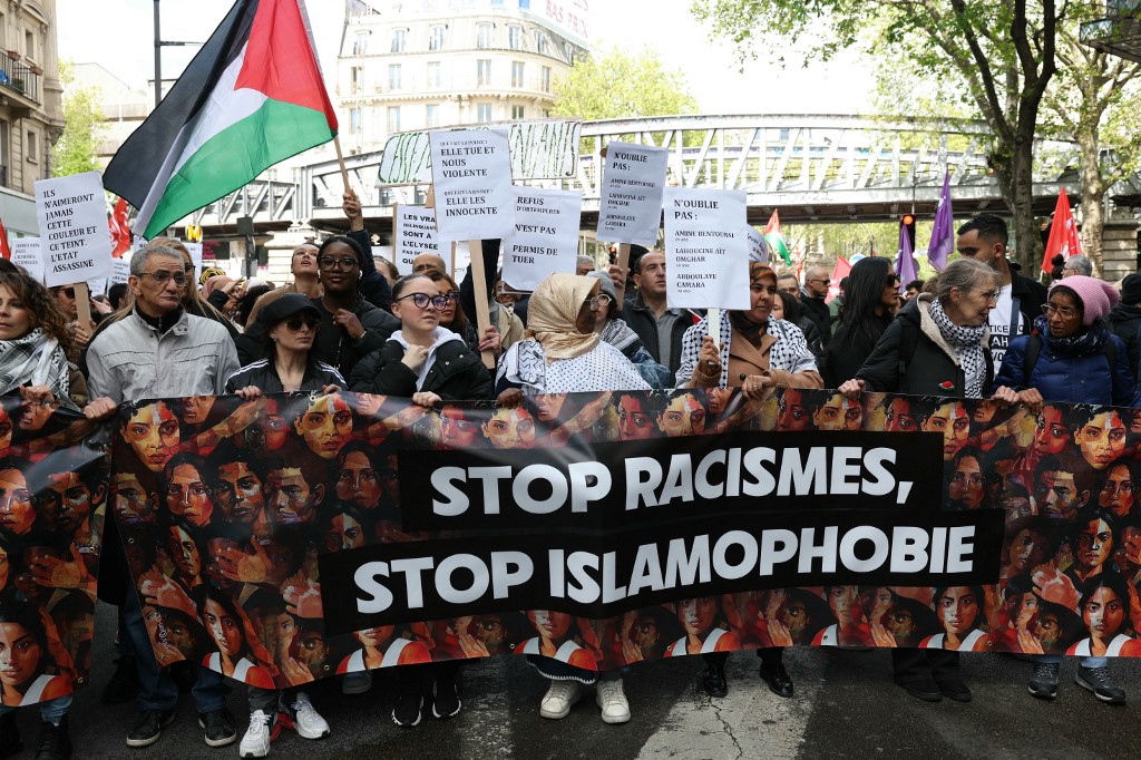 Demonstrators protest against racism and Islamophobia in Paris on 21 April 2024 (Alain Jocard/AFP)