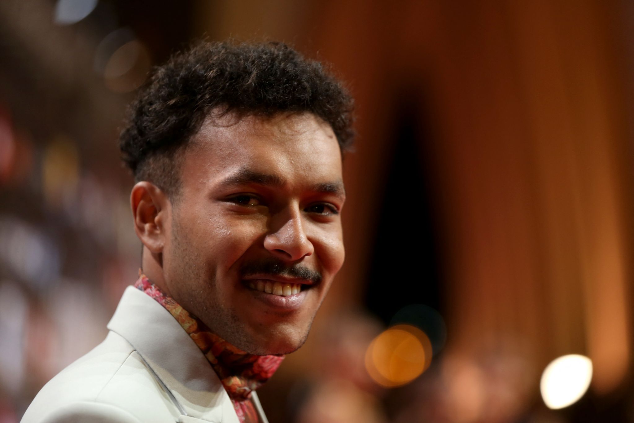 Wegz, whose real name is Ahmed Ali, defies the mould of Maharagant performers because “he’s a college graduate” says Shaker (Patrick Baz/El Gouna Festival/AFP)