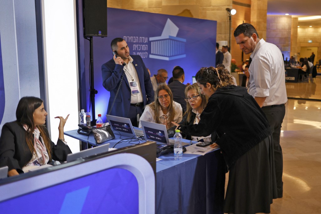 Employees of the Central Elections Committee for the 26th Knesset are pictured in the Knesset building in Jerusalem on October 27, 2026, on the day of Israel's legislative election.