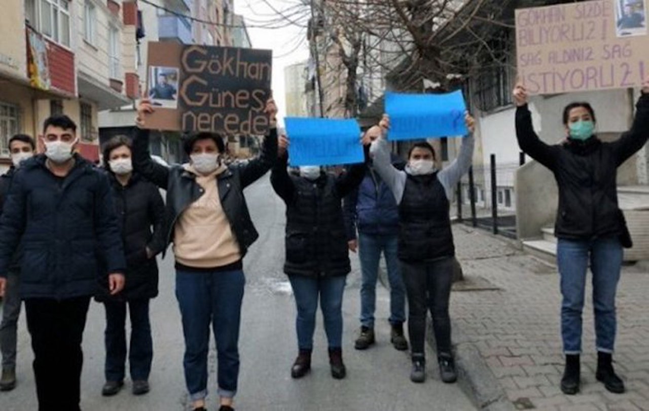 Campaigners hold up placards including one that reads 'Where is Gokhan Gunes?' (Twitter)