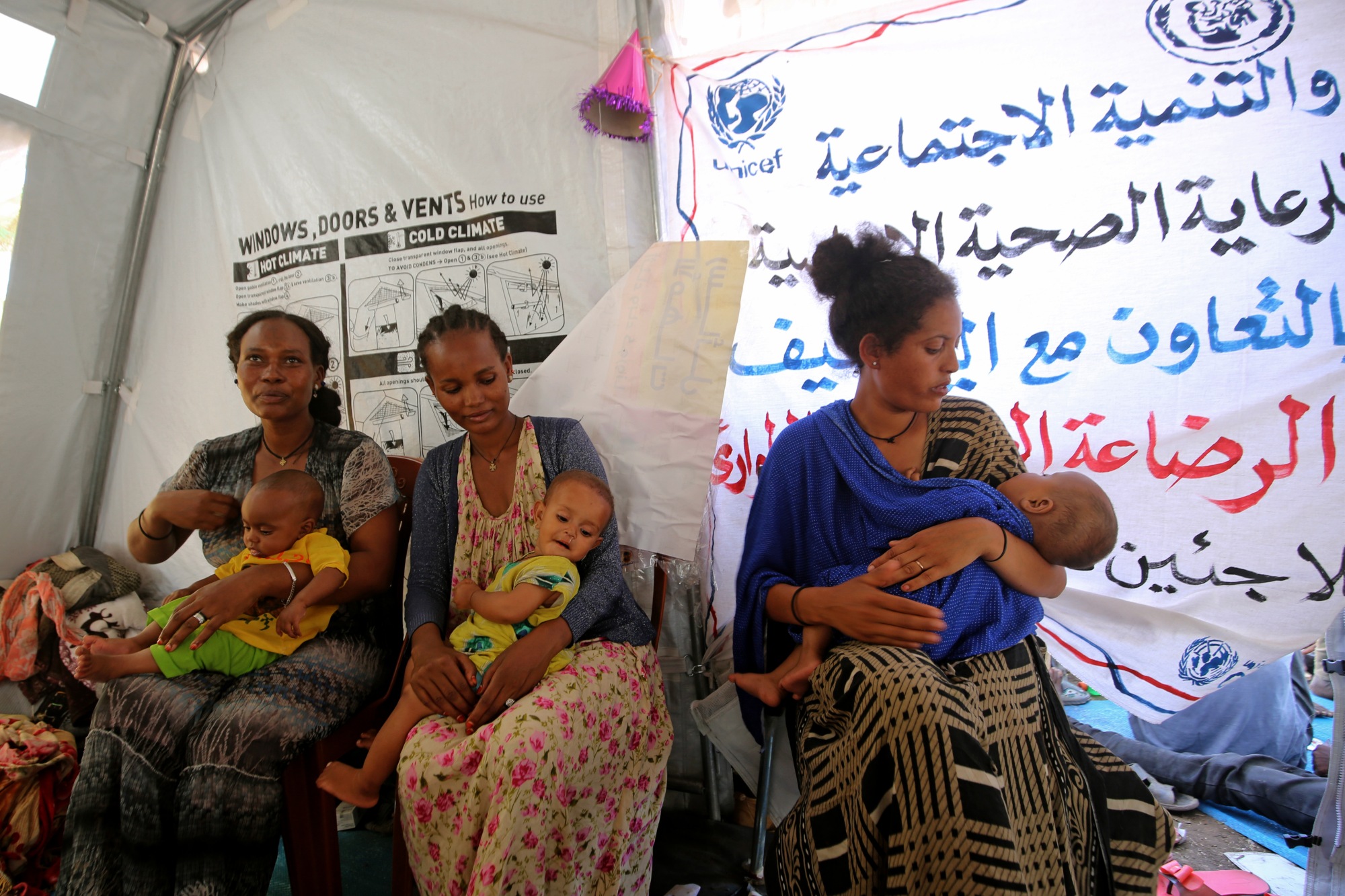 Ethiopian refugees who fled the fighting in the Tigray receive maternity care in the Hamdaiet area of Sudan's eastern Kassala state on 22 November 2020 (AFP)