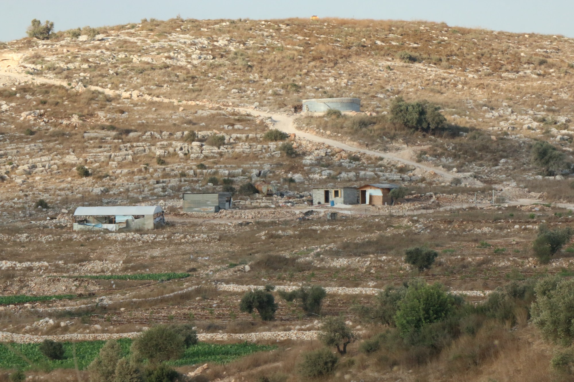 Some of the new permanent structures built in Farasin in recent years are under threat of demolition (MEE/Akram al-Waara)