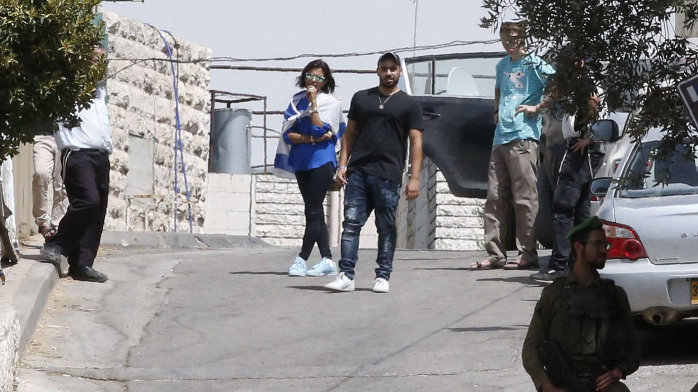 Former Israeli soldier Elor Azaria visits friends in the settlement of Tal Rumeida in Hebron, occupied West Bank, 3 July 2018 (Hazem Bader/AFP)