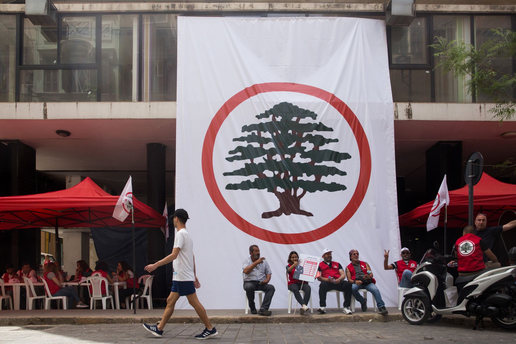 Campaigners with the Lebanese Forces on a street in Gemmayze (MEE/Laurent Perpigna Iban)