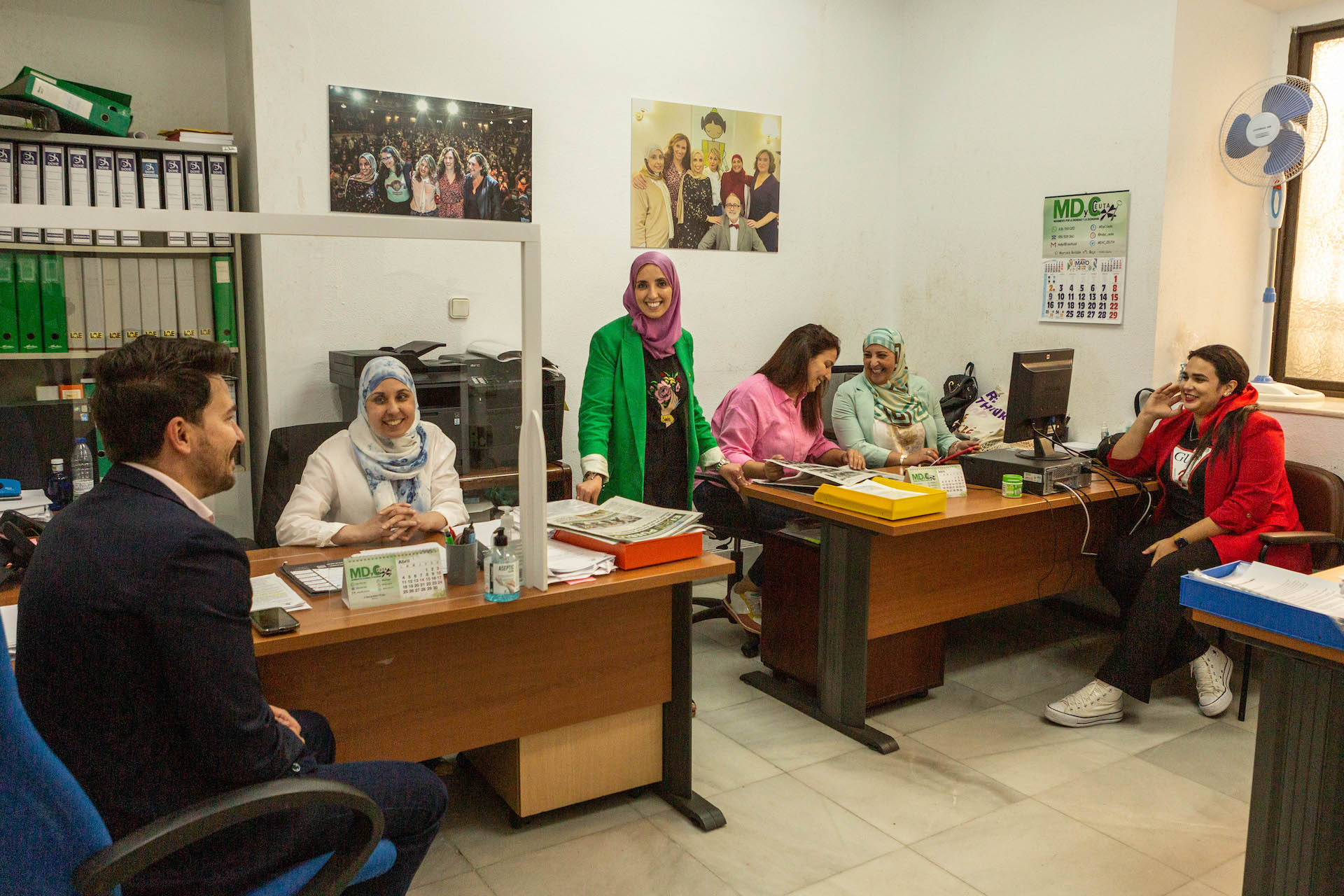 Hossain with her team at her party's office inside the regional assembly of Ceuta (Marta Morata)