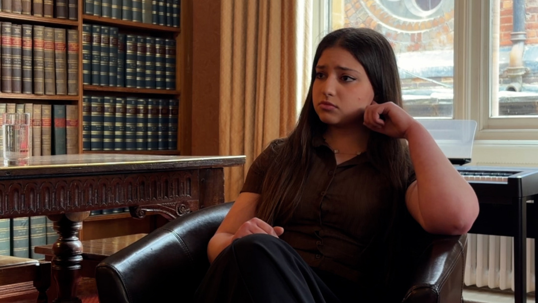 Oxford Union President Arwa Elrayess speaks to MEE in the Gladstone Room on Wednesday. (Mohammed Adnan/MEE)