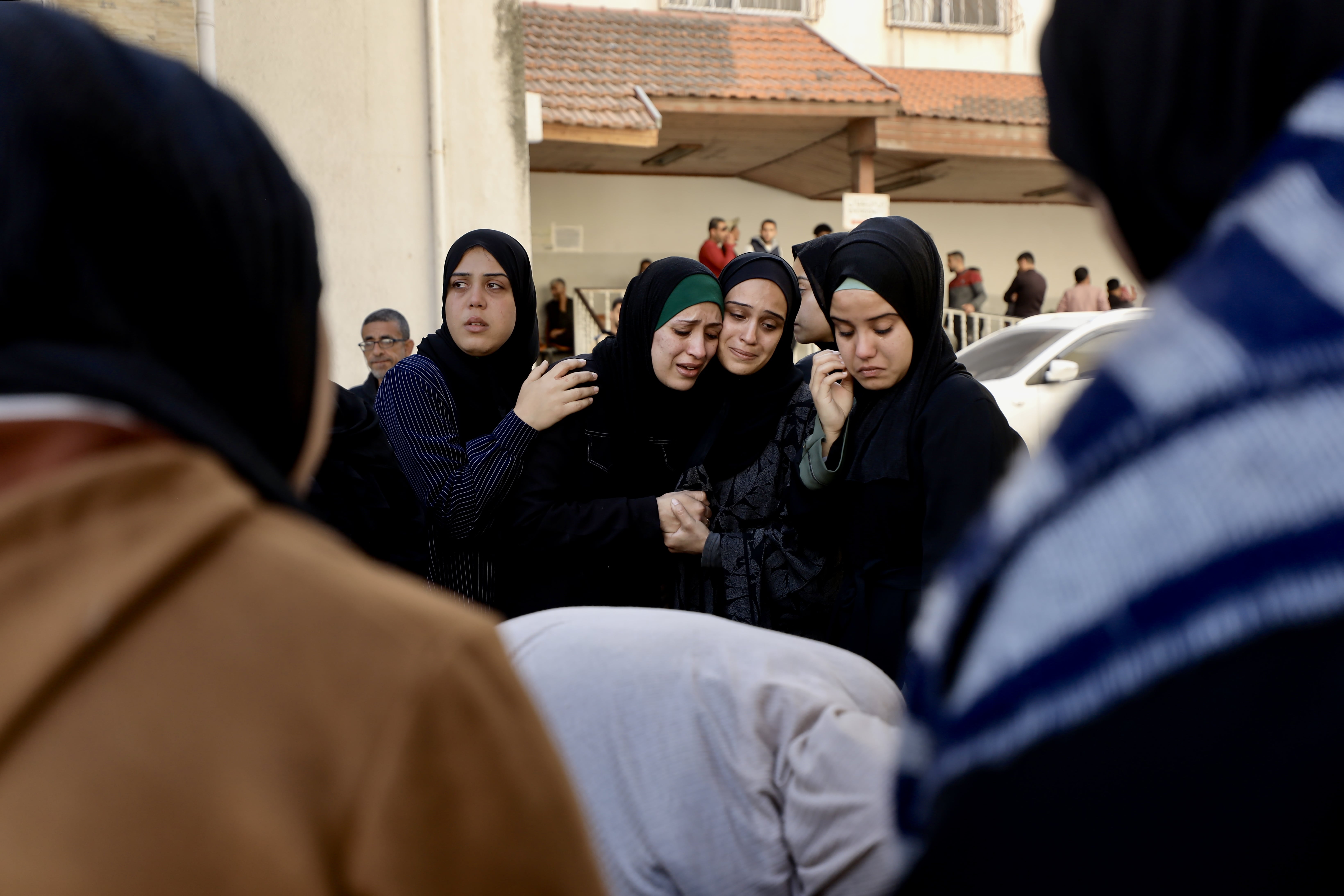 Mourners react to the bodies of Palestinians killed in Israeli strikes on Gaza Strip March 18, 2025.