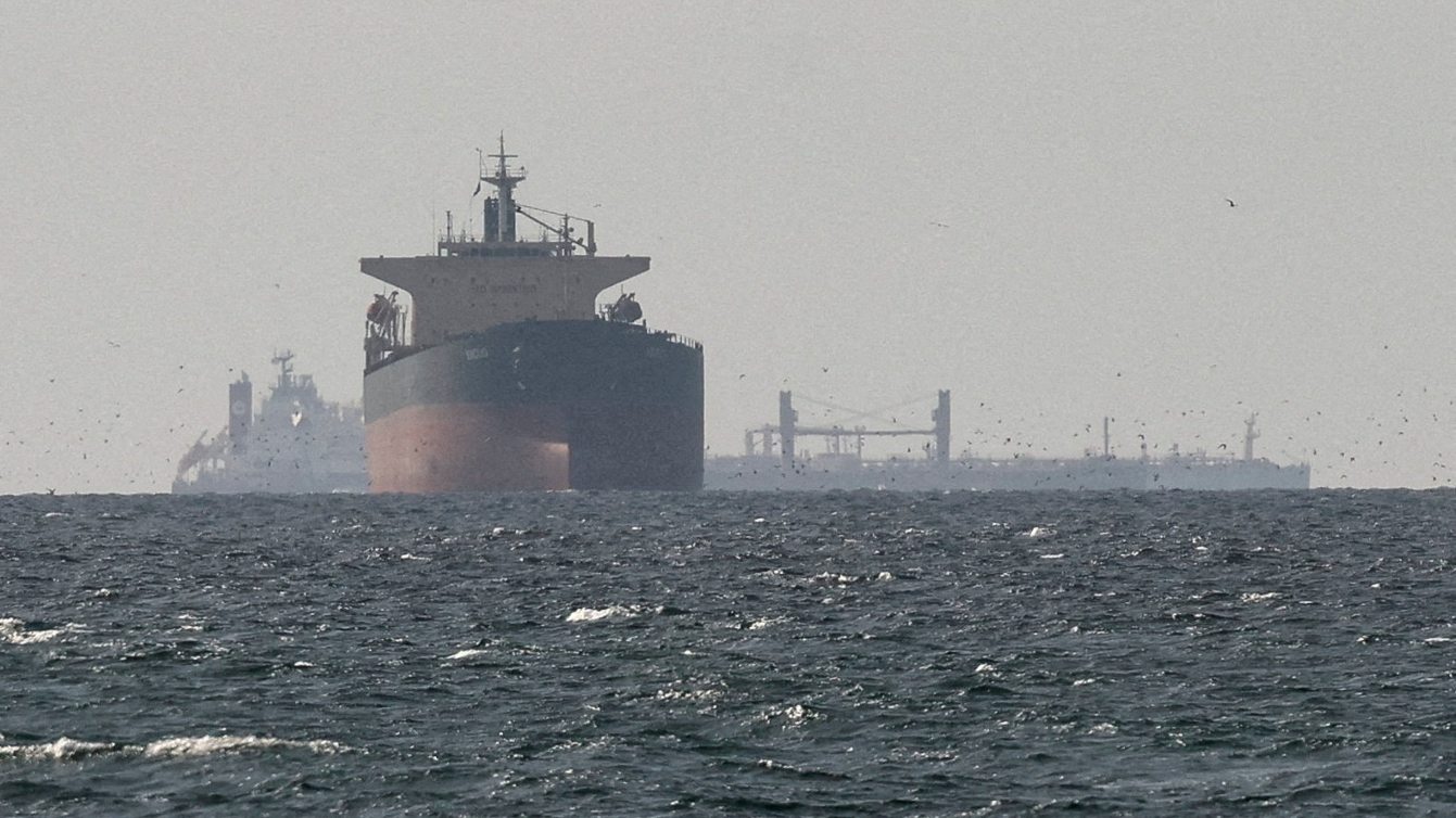 Cargo ships in the Gulf, near the Strait of Hormuz, as seen from northern Ras al-Khaimah, near the border with Oman’s Musandam governance, amid the U.S.-Israeli conflict with Iran, in United Arab Emirates, March 11, 2026. REUTERS/Stringer/File Photo/File Photo