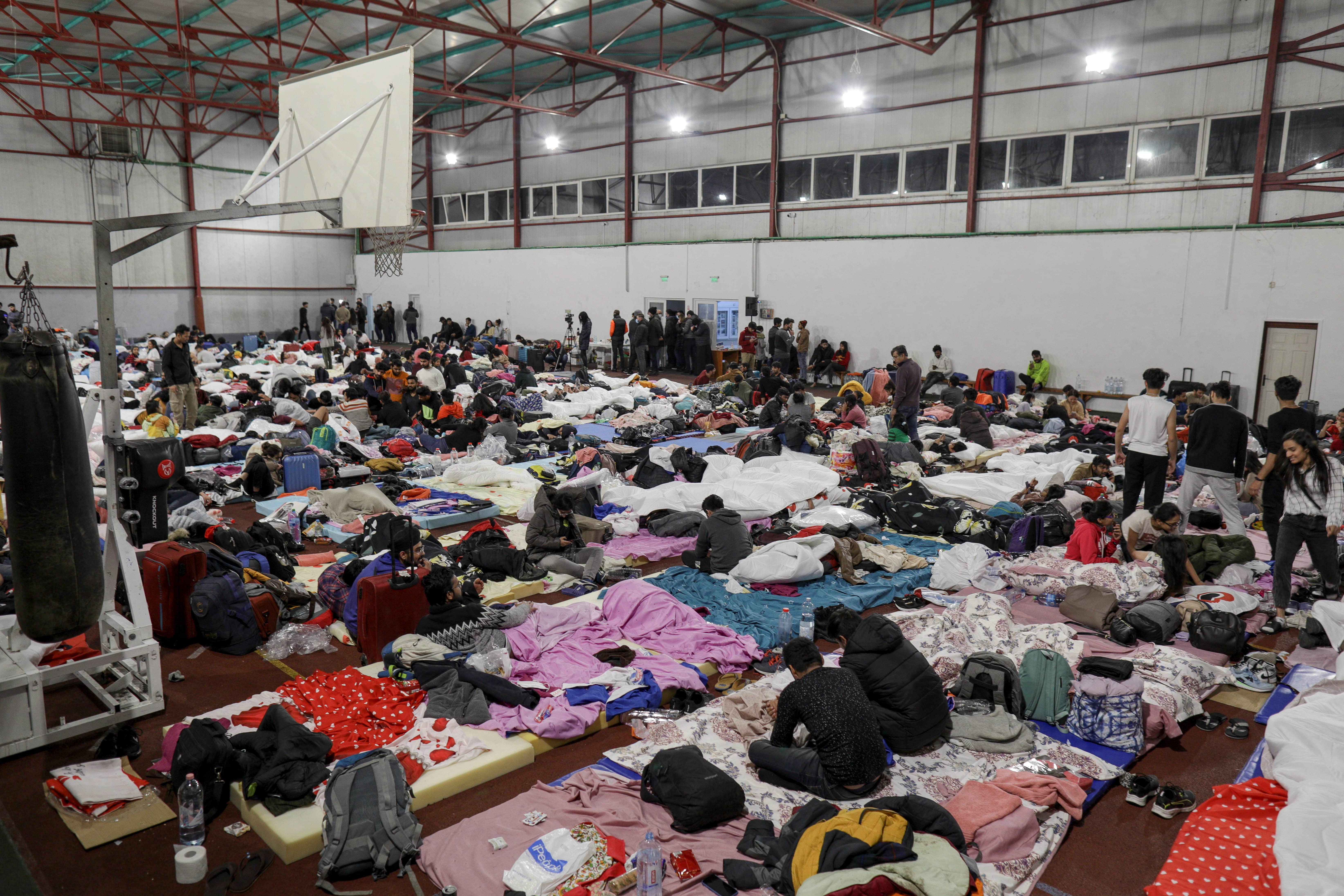 Indian students that fled Ukraine rest in a sports hall in Voluntari, Ilfov, near Bucharest, Romania, on 28 February 28. (Reuters)