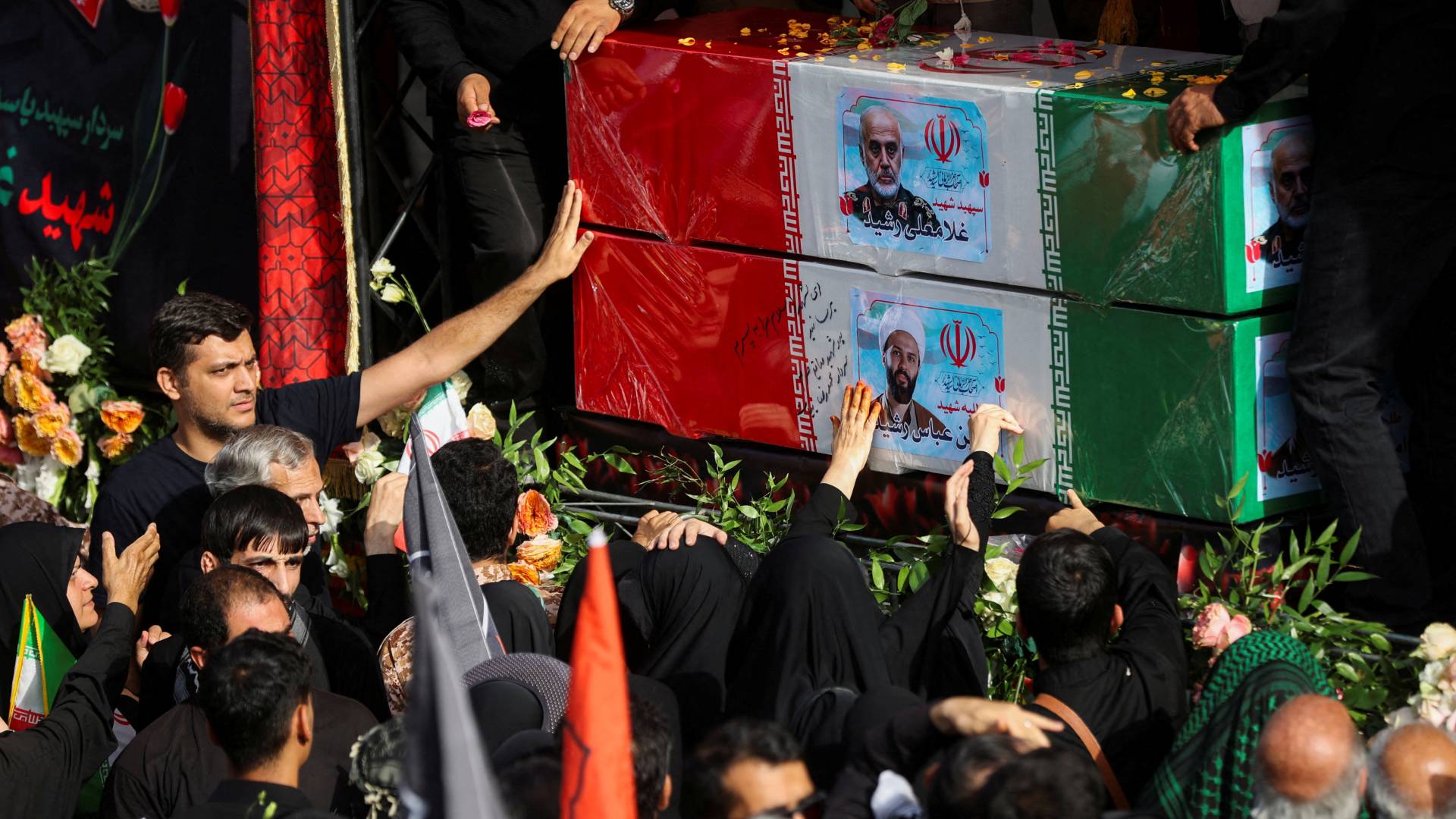 Tehran honours 60 people killed in the 12-day war including military commanders, nuclear scientists, women and children, as their portraits are displayed on their coffins (Reuters)