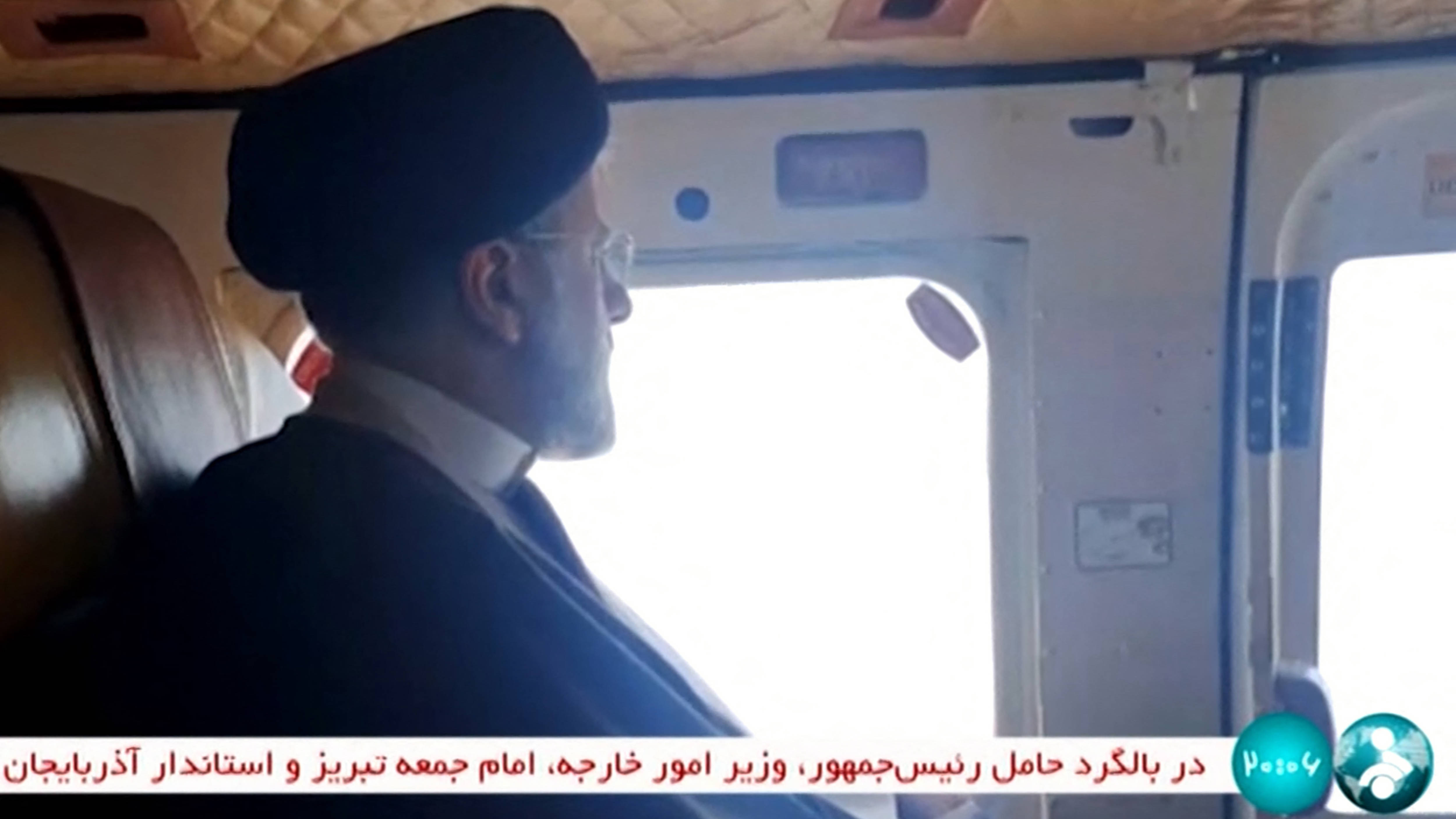 This video grab shows Iran's President Ebrahim Raisi on board a helicopter in the Jolfa region of the western province of East Azerbaijan, 19 May 2024 (IRINN/AFP) 