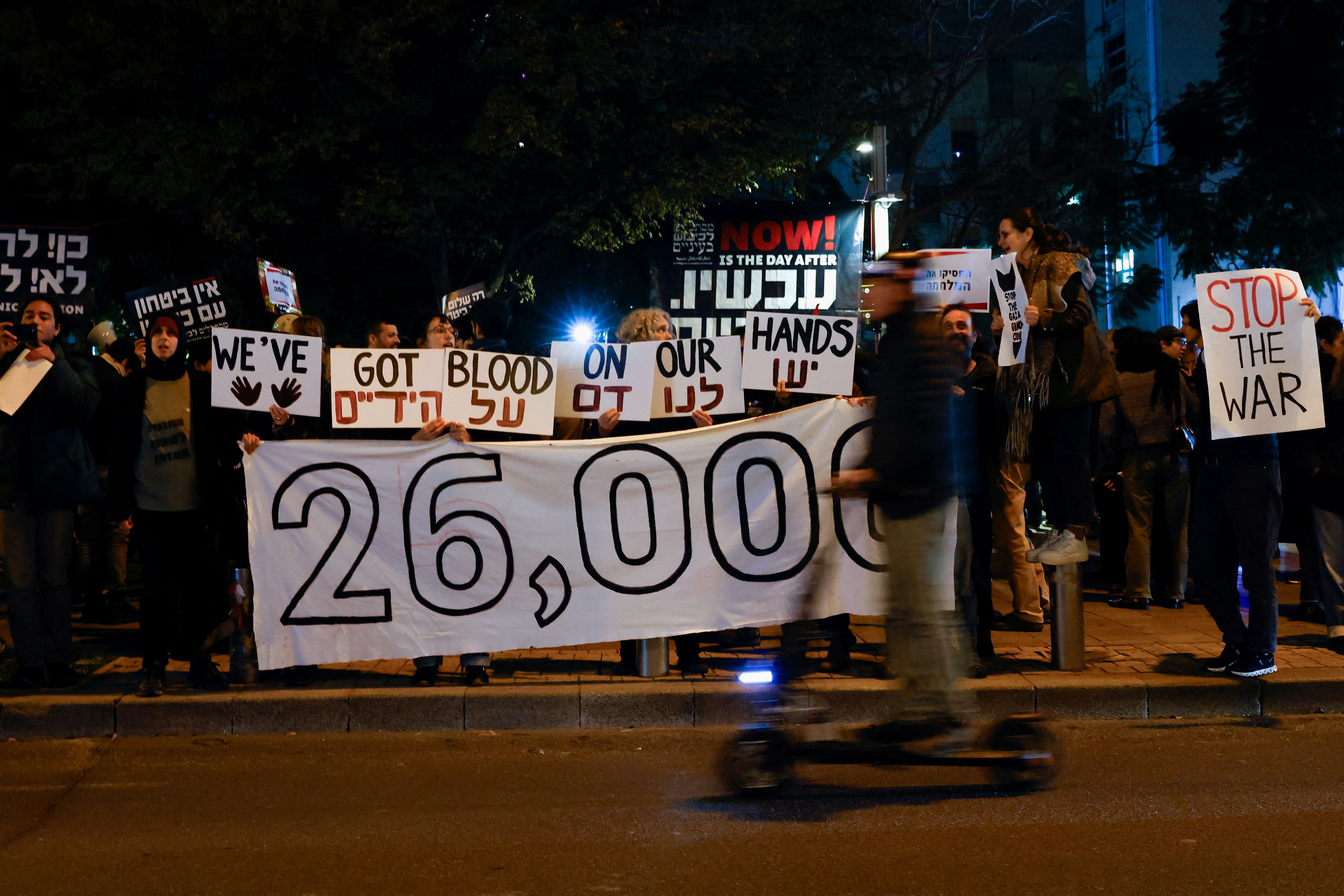 Demonstrators attend a rally demanding an immediate ceasefire in Gaza, in Tel Aviv, Israel, on 27 January (Reuters/Tyrone Siu)