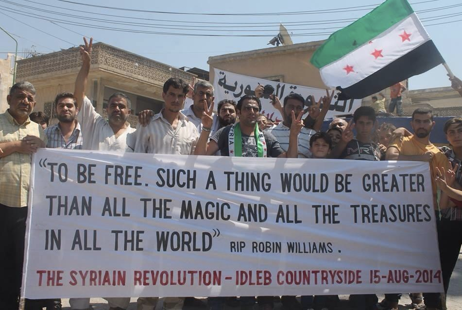 A Kafranbel banner references the death of American comedian Robin Williams (Facebook)