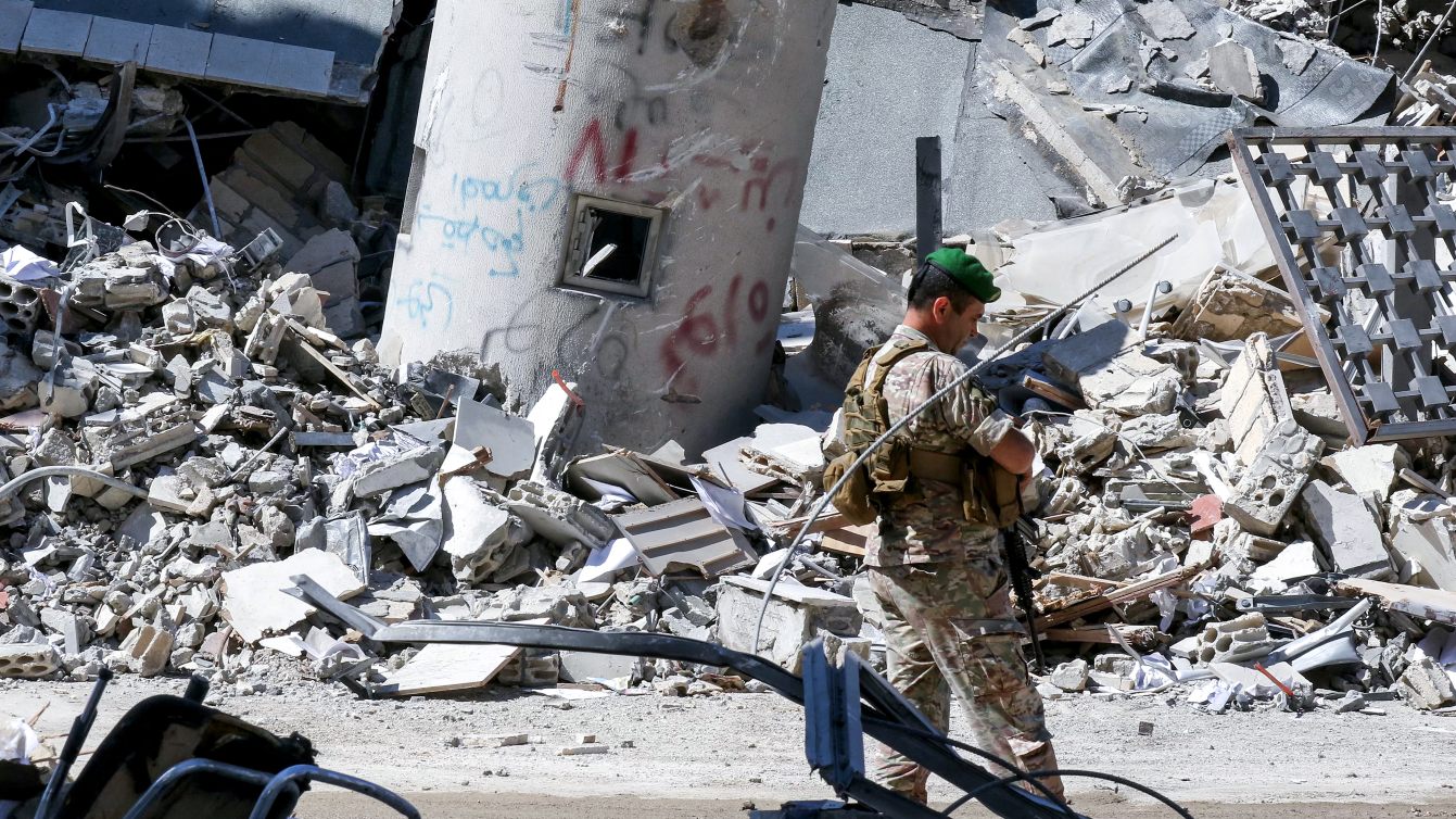 Lebanese army soldier walks past the rubble of a branch of Lebanon’s central bank in Nabatieh following Israeli bombardment, 21 June 2026 (Mahmoud Zayyat/AFP)