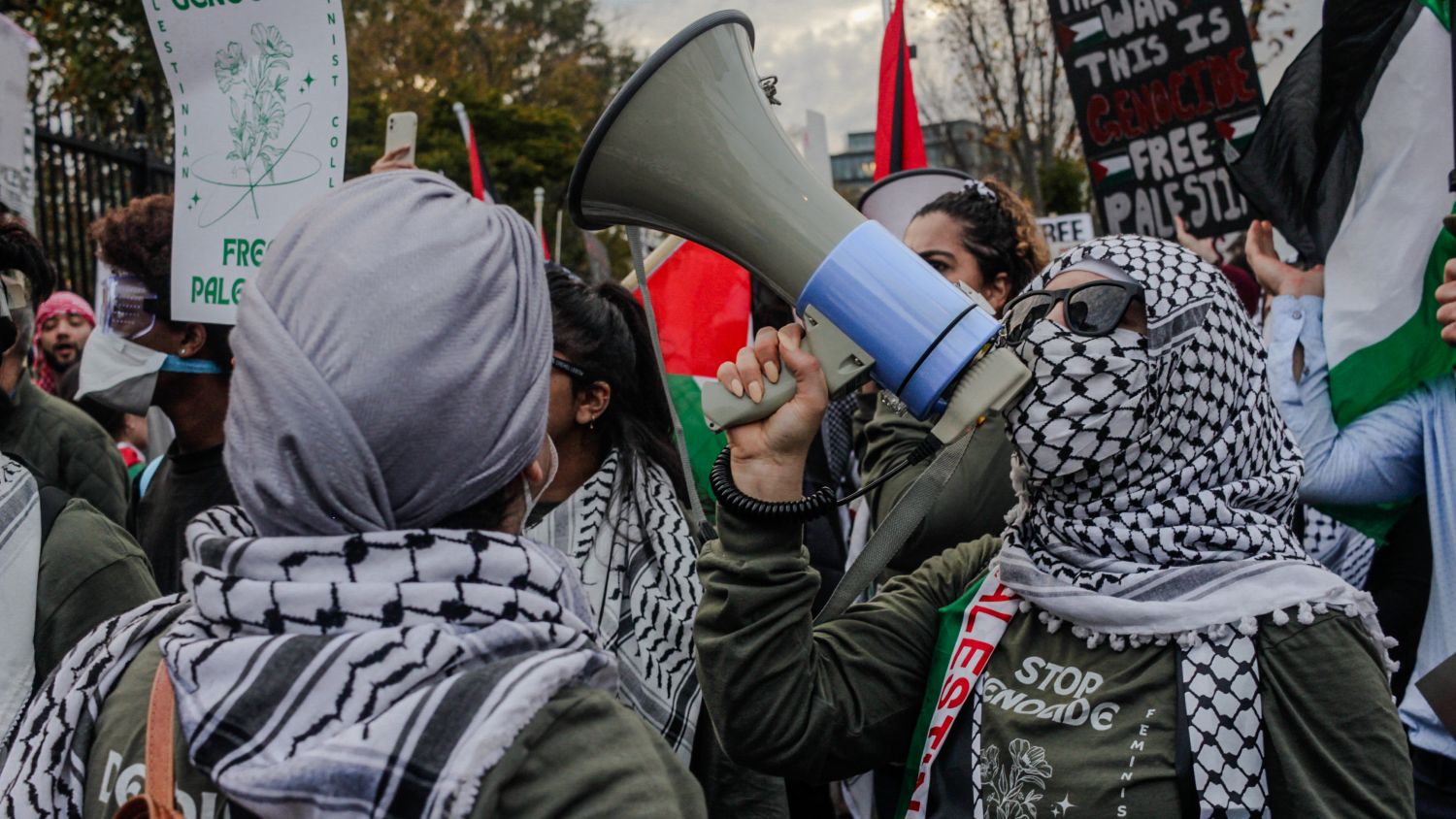 Protestor leads chant at the White House during the national march for Palestine in Washington on 4 November.