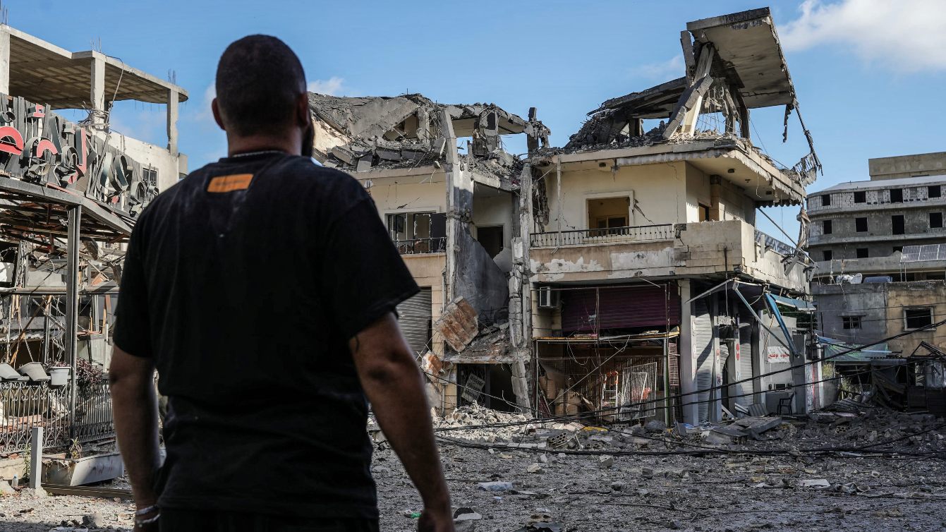 Man stands in front of destroyed building in central Nabatieh, southern Lebanon, 15 June 2026 (Abbas Fakih/AFP)