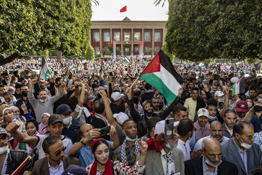 Moroccans protest Israel’s offensive on Gaza in Rabat on 16 May 2021 (AFP)