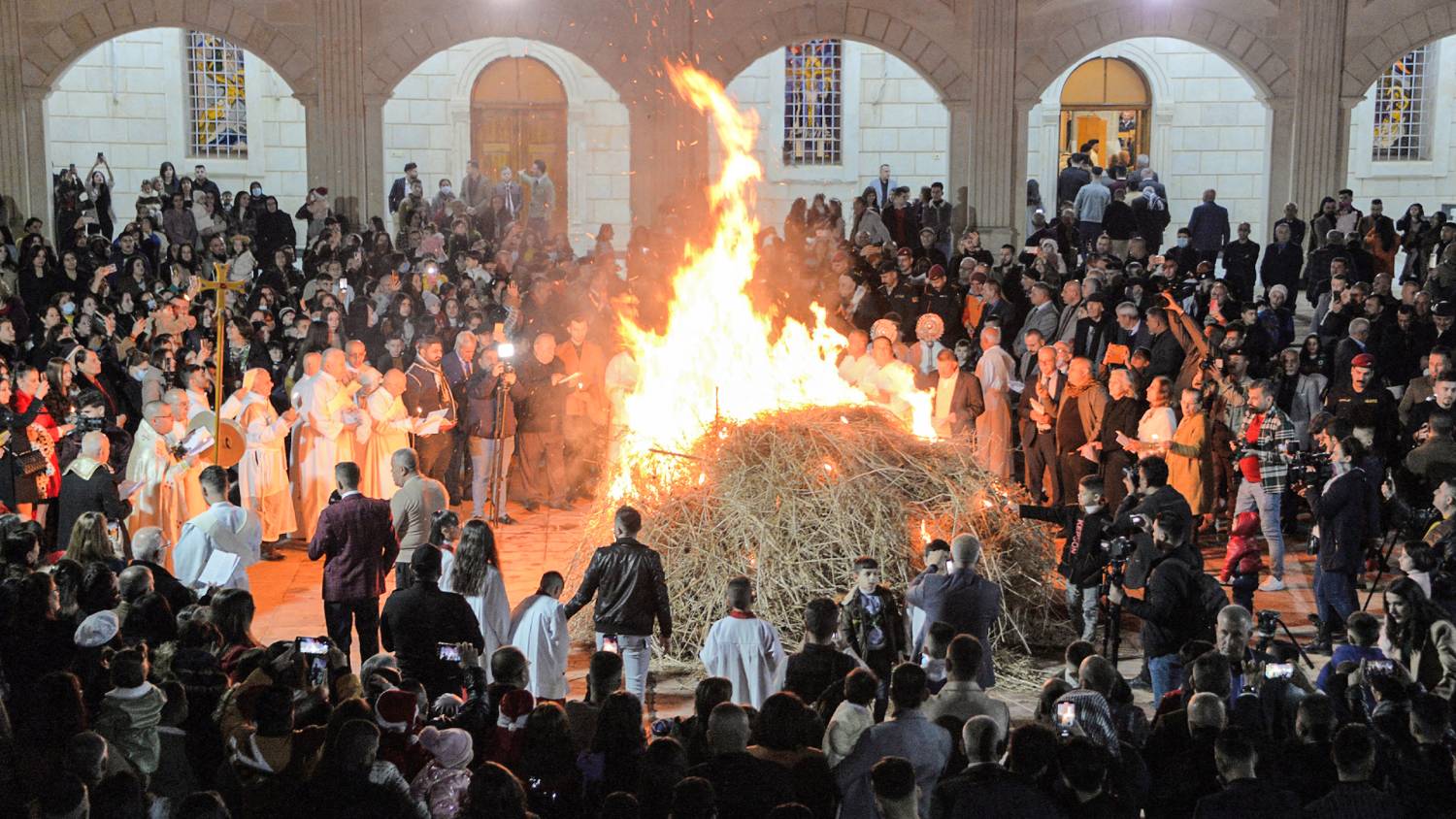 The ashes remaining after the traditional Christmas bonfire determine whether the year ahead will be a prosperous one (AFP)