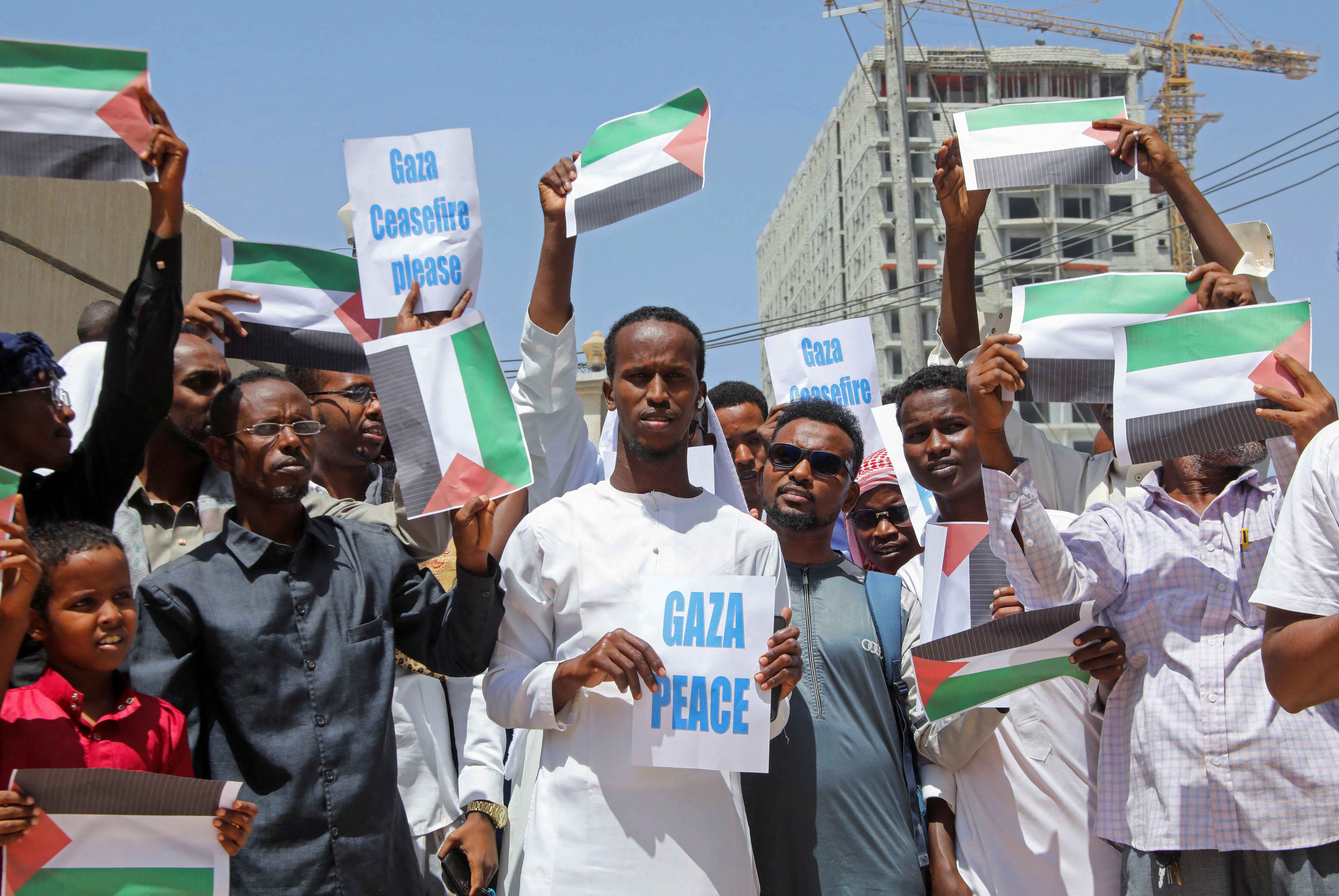 Rally in support of Palestinians in Gaza after the news of a ceasefire between Hamas and Israel, outside the Omar ibn al-Khattab in Mogadishu, Somalia (Reuters/Feisal Omar)