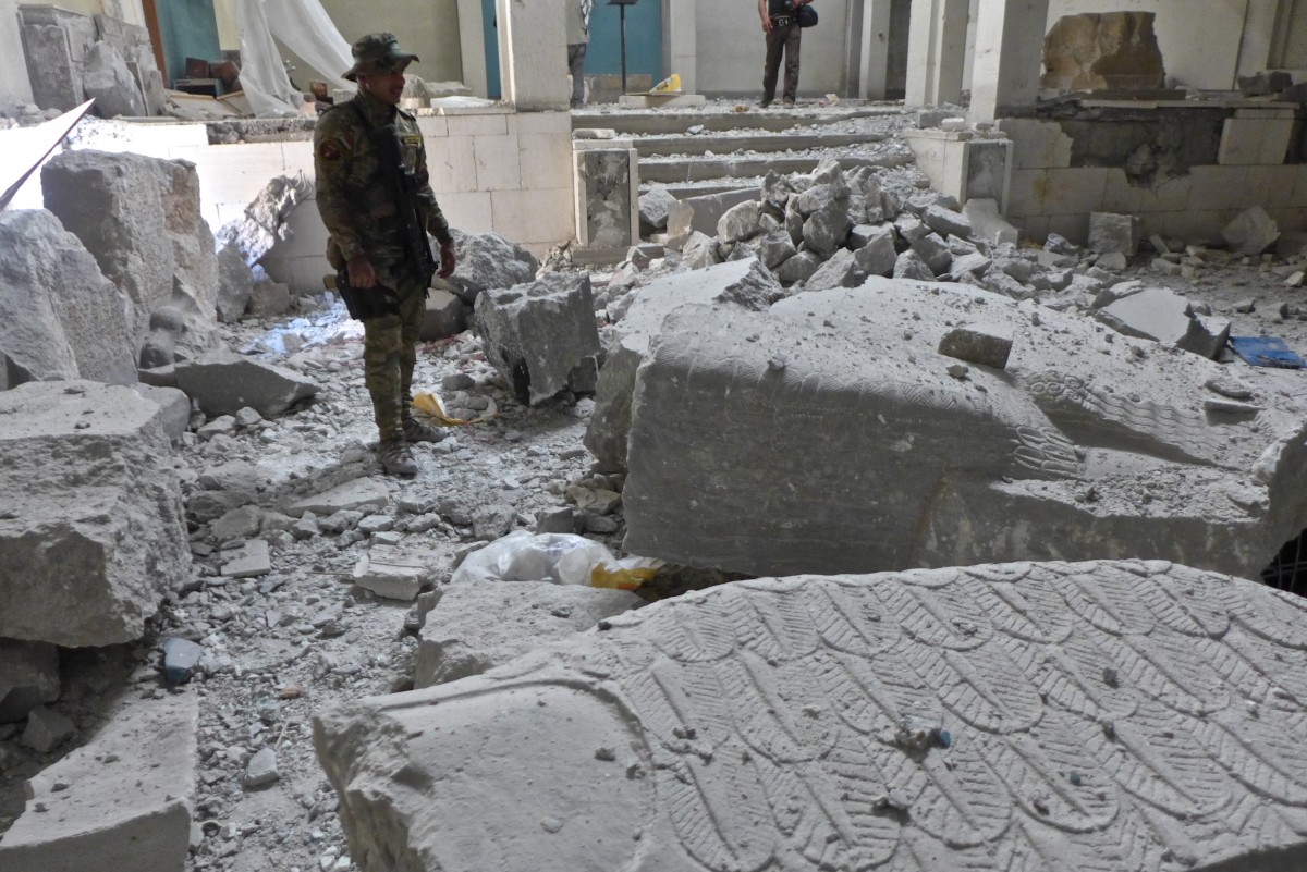 A special forces soldier stands in Mosul Museum, just days after liberation from IS (MEE/Tom Westcott)