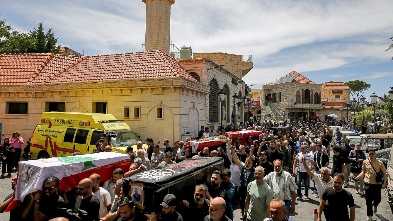 Mourners carry coffins of six Abdallah family members during funeral procession in Wardanieh, Lebanon, 3 June 2026 (Marwan Naamani/ZUMA Press Wire)