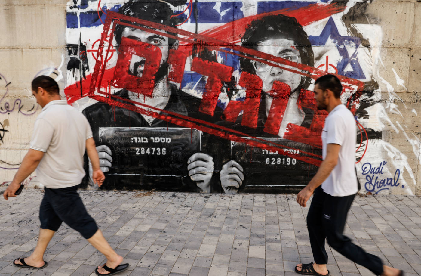 The reaction to NAZA in Israel has been critical, including this mural of the film-makers in Ashdod which includes the word “Traitors” (Reuters)