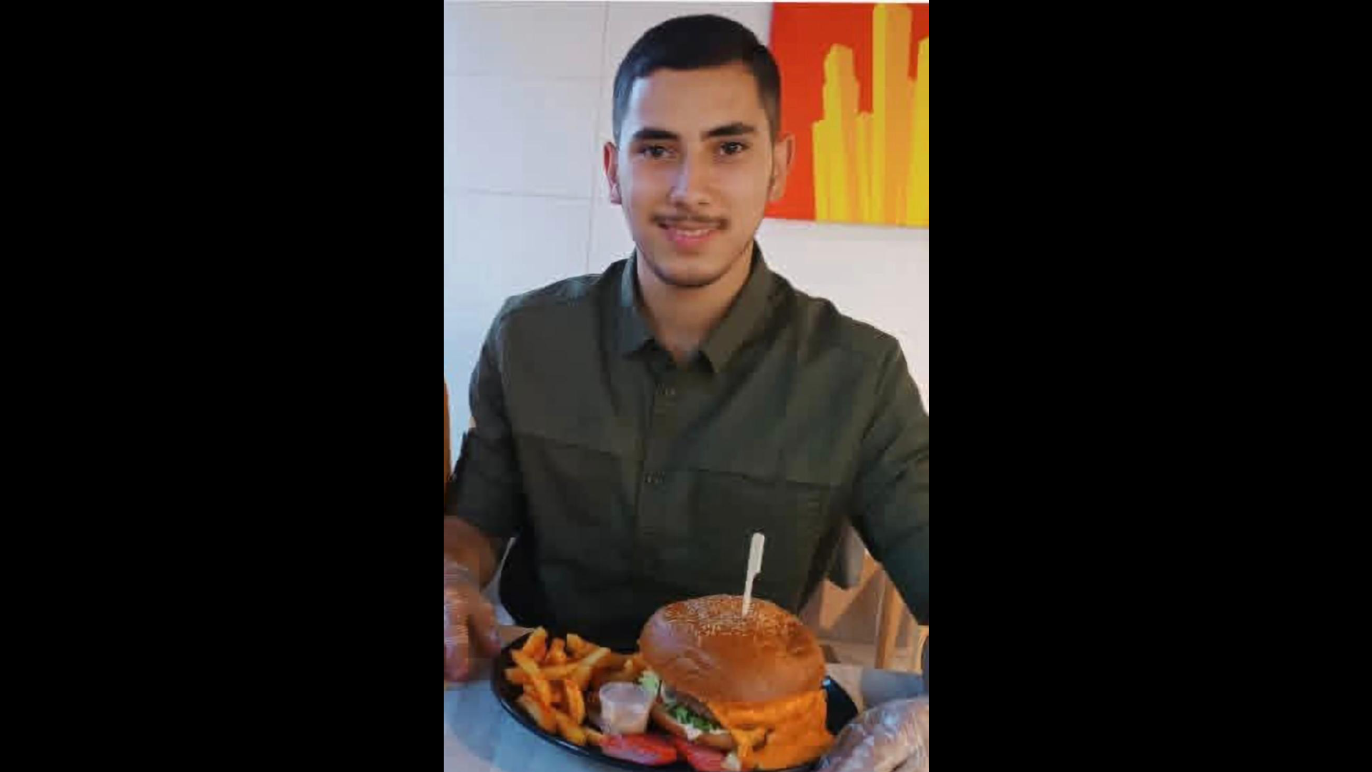 Yahya Nasman at a restaurant in Gaza, in a photo taken a few months before he was killed (Provided)