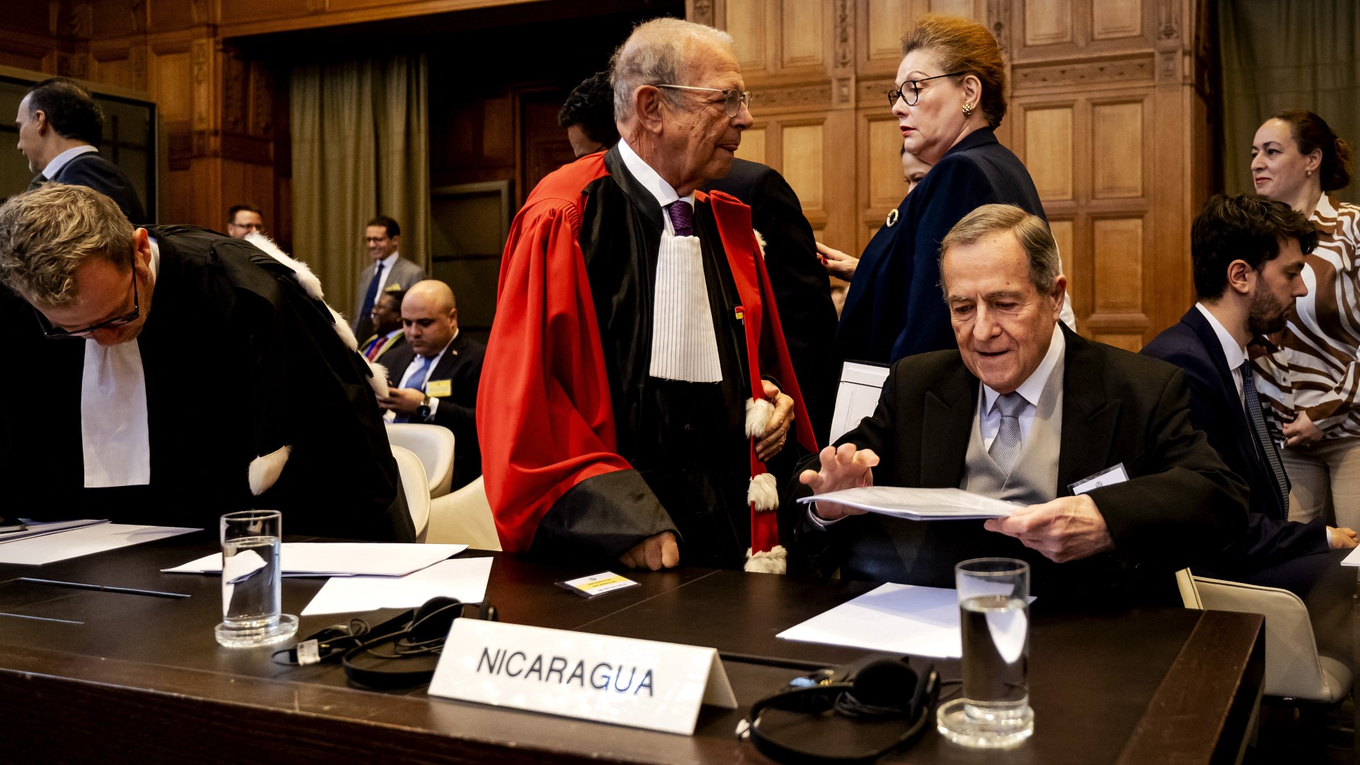Nicaragua's Ambassador to The Netherlands Carlos Jose Arguello Gomez (R) attends a hearing at the International Court of Justice (ICJ) in a case filed by Nicaragua against Germany demanding judges impose emergency measures to stop Berlin providing Israel with weapons and other assistance, in the Hague on April 8. (AFP)