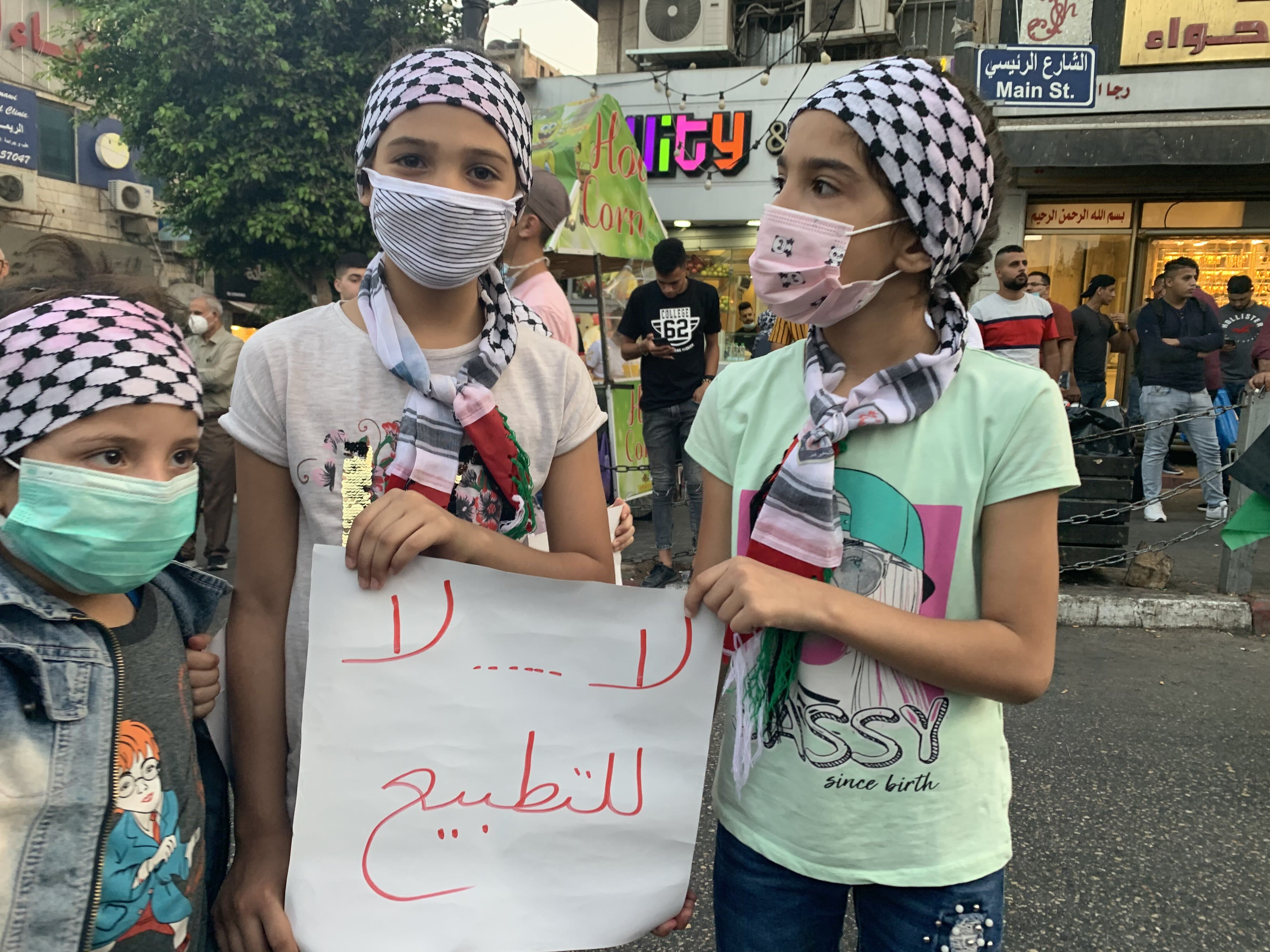 Palestinians in in Ramallah protest against the signing of normalisation accords between Israel and the UAE and Bahrain (MEE/Shatha Hammad)