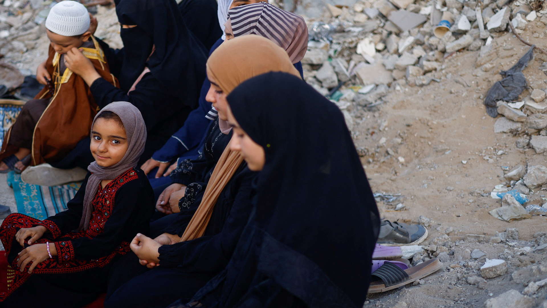 palestinians hold Eid prayers al-rahma mosque June 16