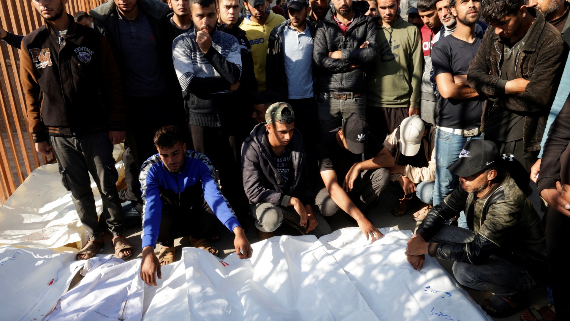 Palestinians hold funeral prayers for family members killed in an air strike on Khan Younis (Reuters/Hatem Khaled)