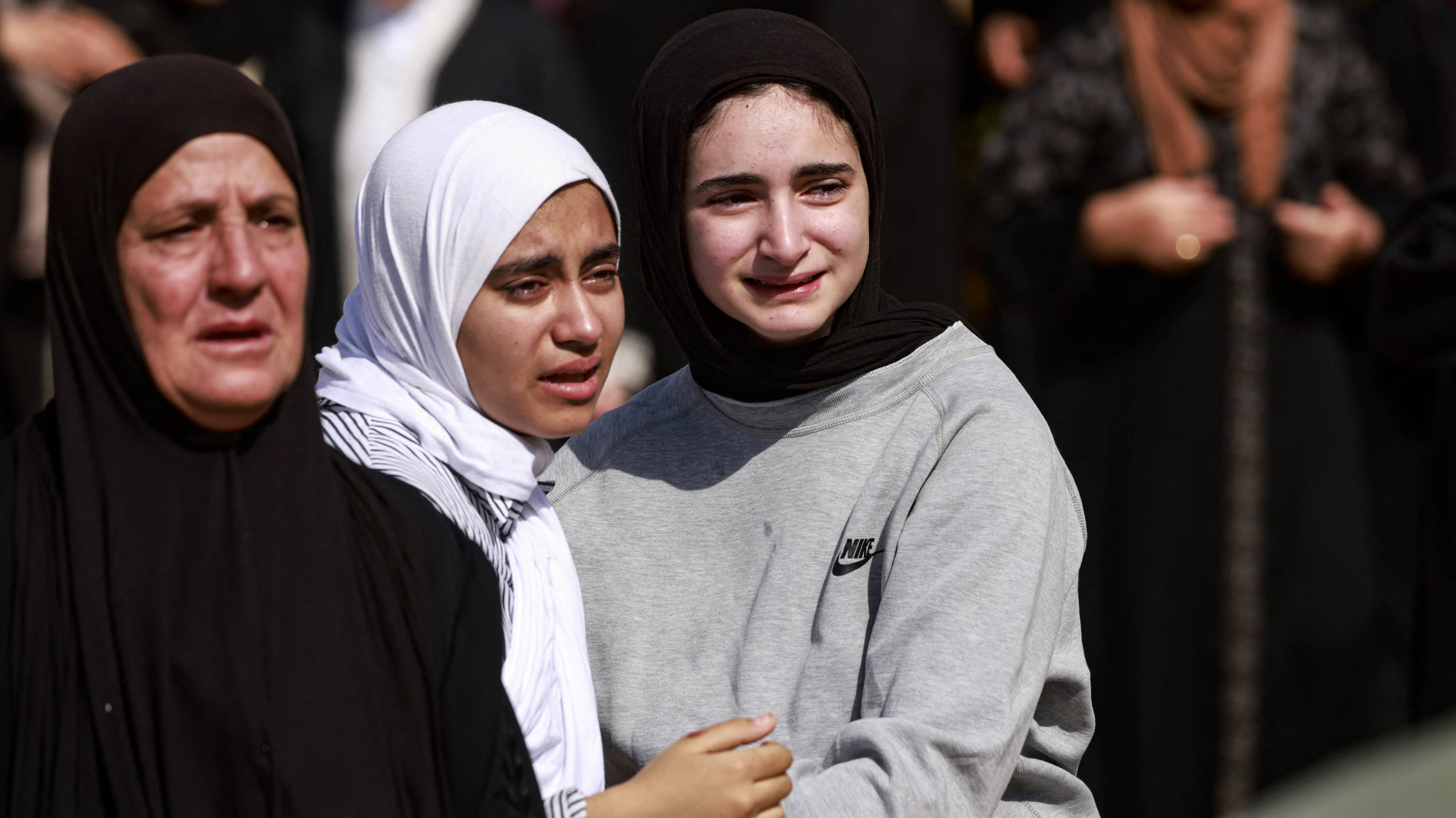 Mourners react during the funeral procession of Palestinians killed in the Israel raid in the Jenin refugee camp, 6 September 2024 (AFP)