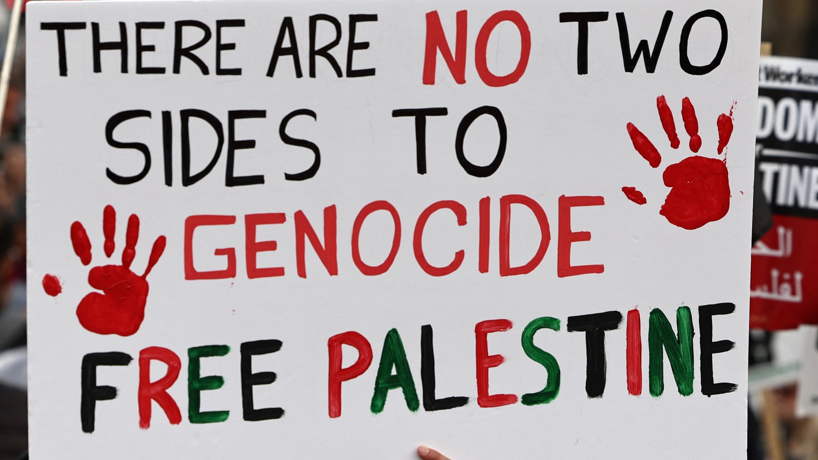 People take part in a 'March For Palestine', in London on October 21, 2023, to 