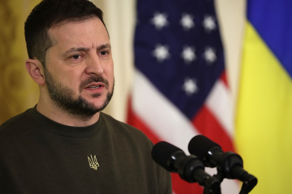 President of Ukraine Volodymyr Zelensky speaks at the White House during his recent visit to Washington DC, 21 December 2022 (AFP)