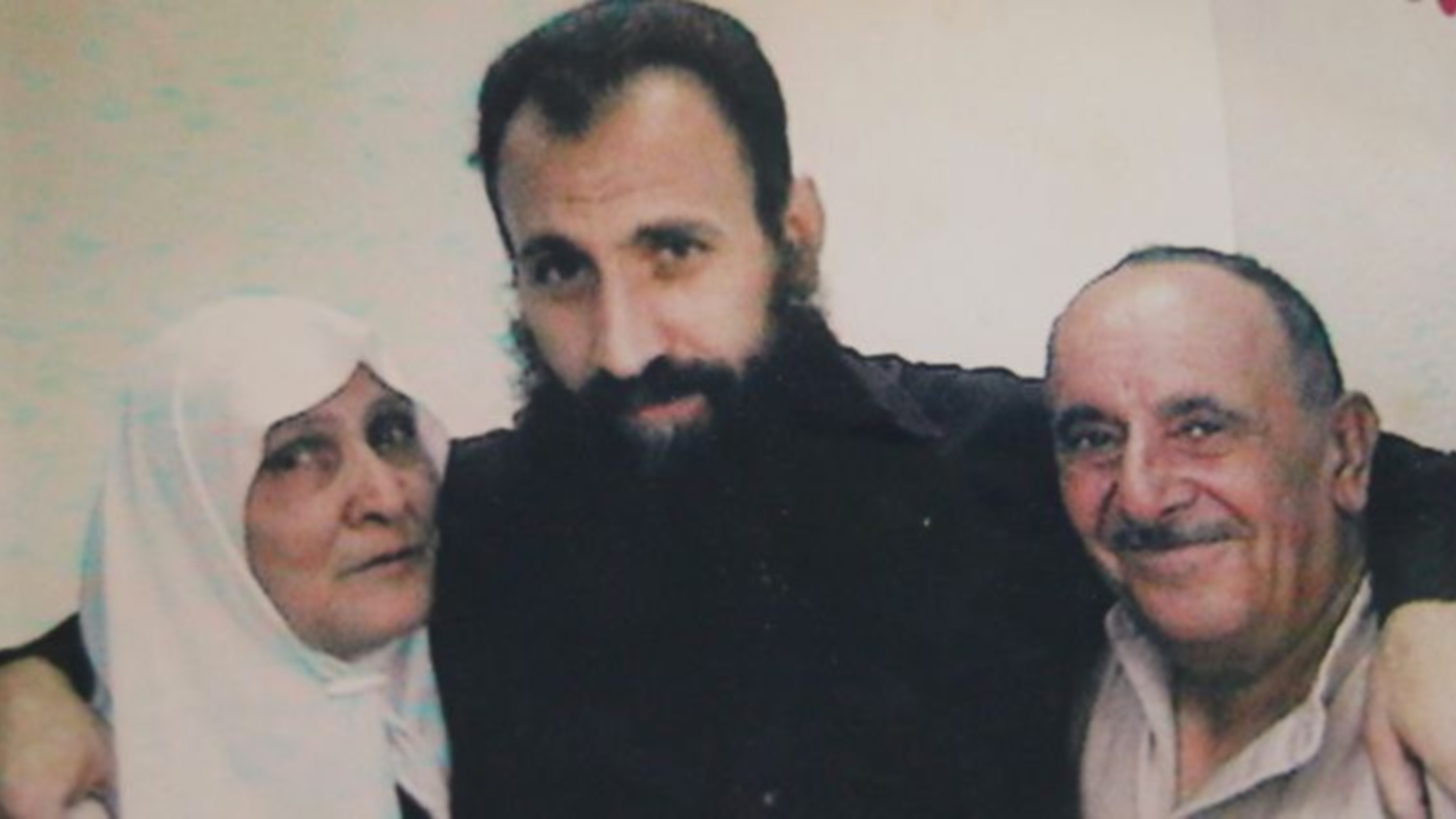 Raed al-Saadi (center) would have served 36 years in Israeli prison (Social media)
