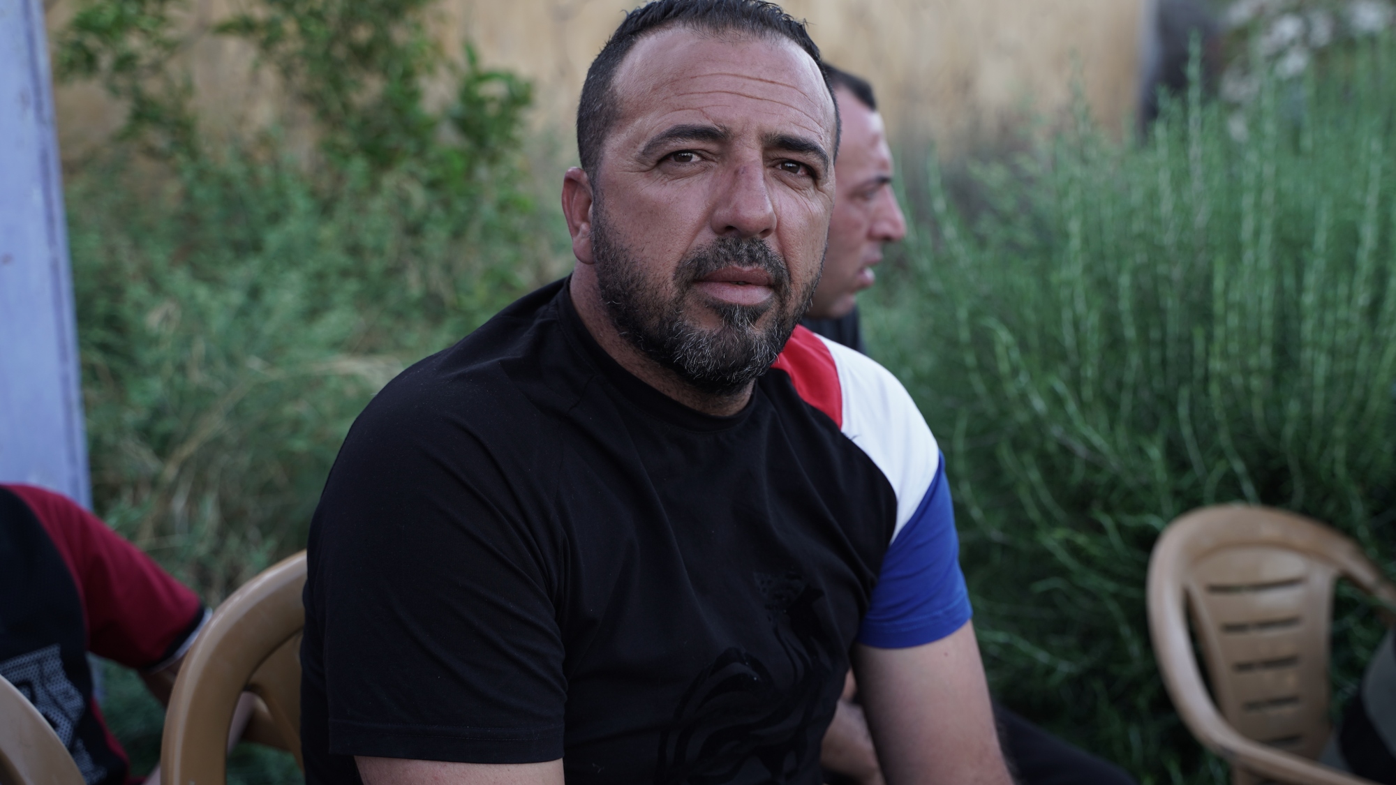 Israeli soldiers who shot Wajdi Jaafra 'left him to die on the ground', his cousin Rafat Jaafra (pictured) said (MEE/Akram al-Waara)