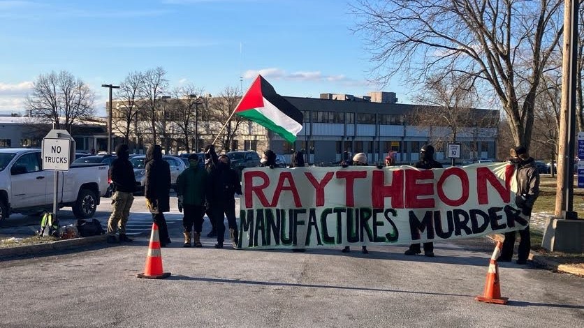 Protesters prevent workers at a local weapons manufacturing plant from entering, in protest of US weapons being sent to Israel.